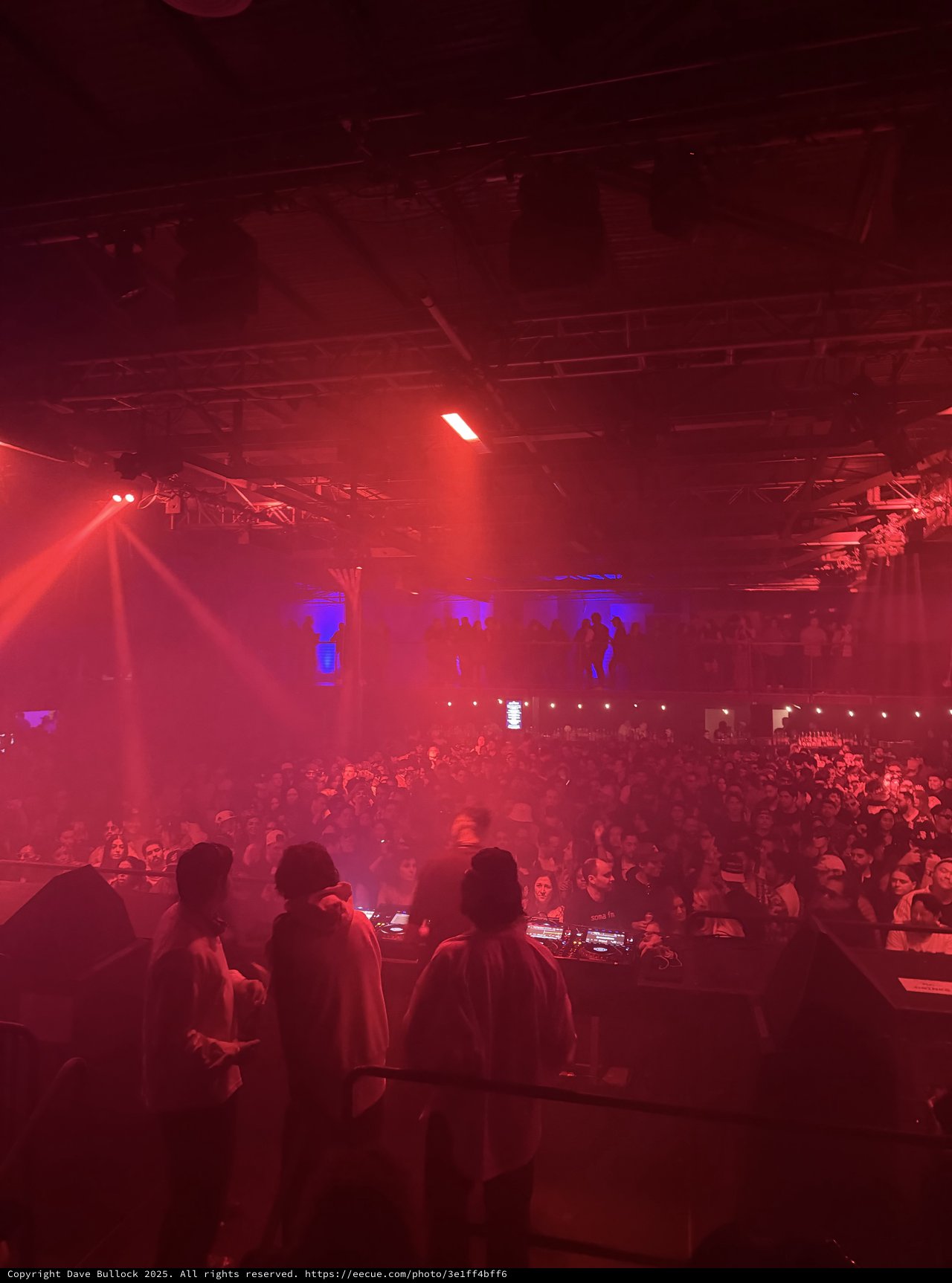 Skrillex and Four Tet Concert Bathed in Red Light