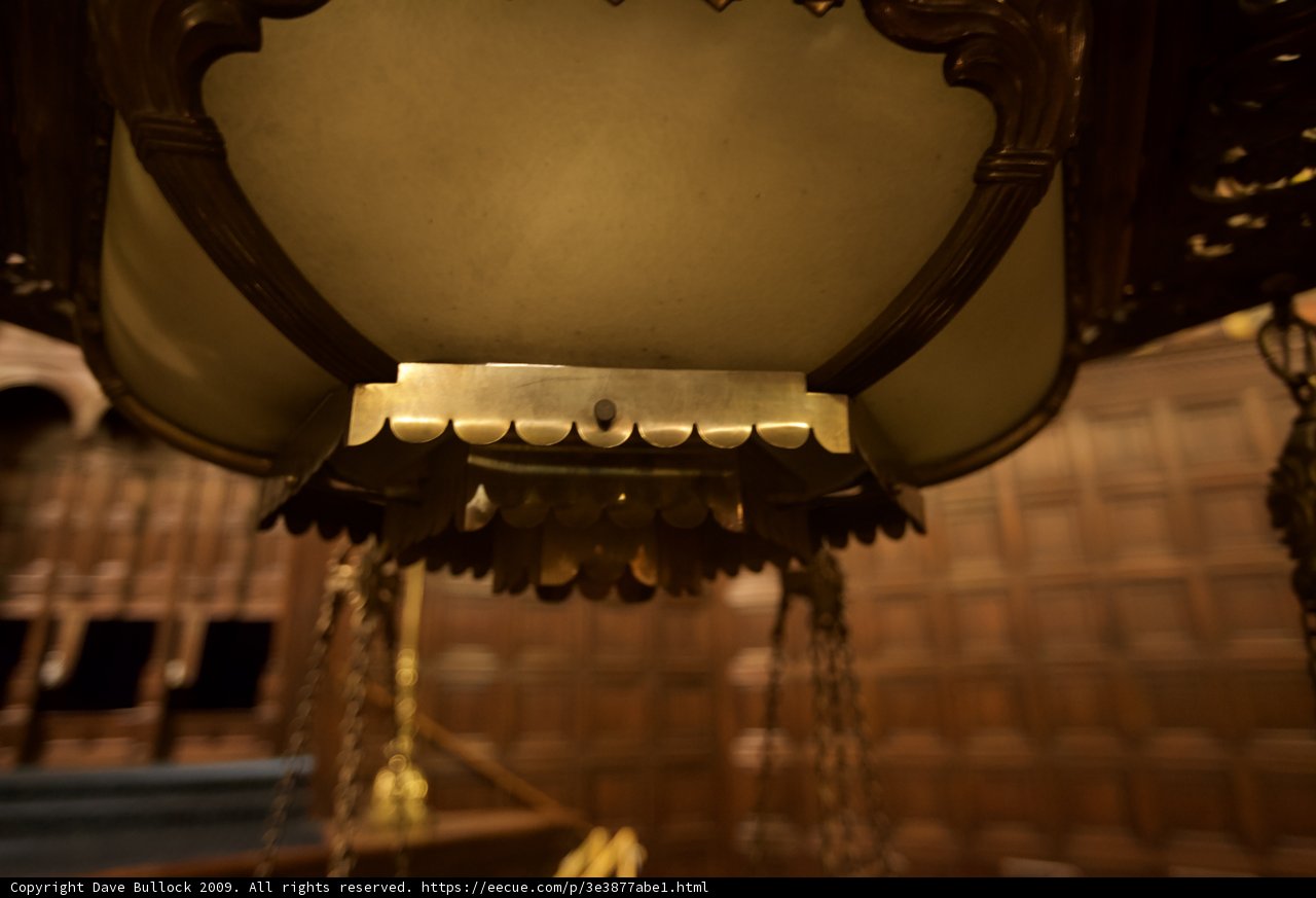 Elegant Lighting Fixture in a Crypt-like Room