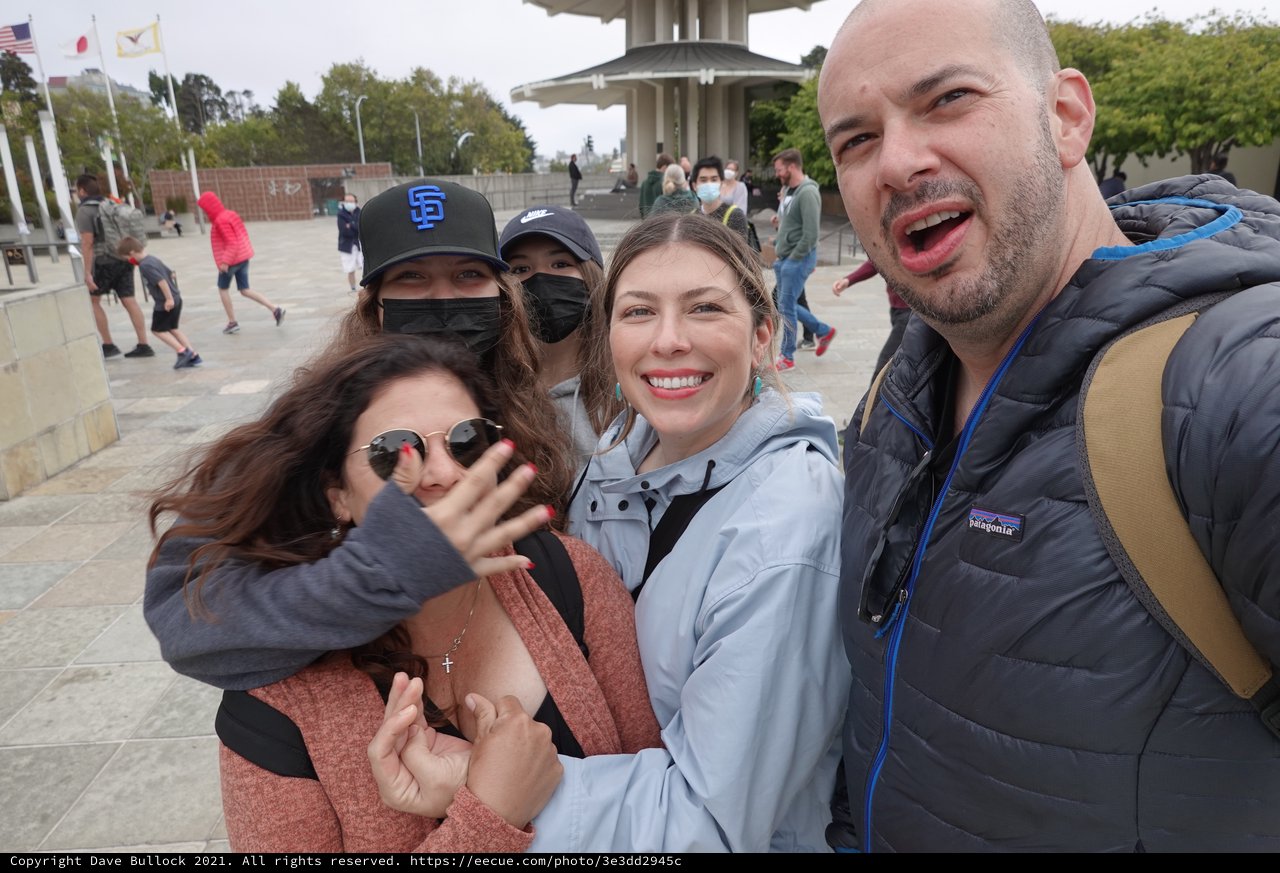 Joyful Group Selfie at Memorial Monument