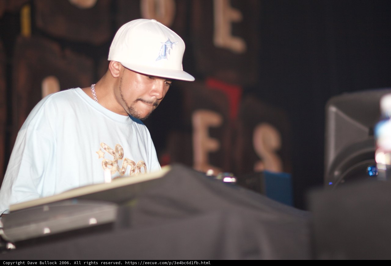 DJ Craze in White Shirt and Baseball Cap