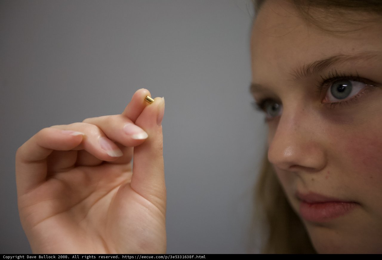 Holding Gold Tooth