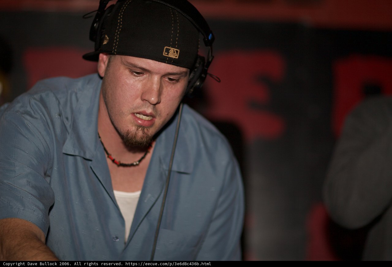 Travis B in Blue Shirt and Baseball Cap