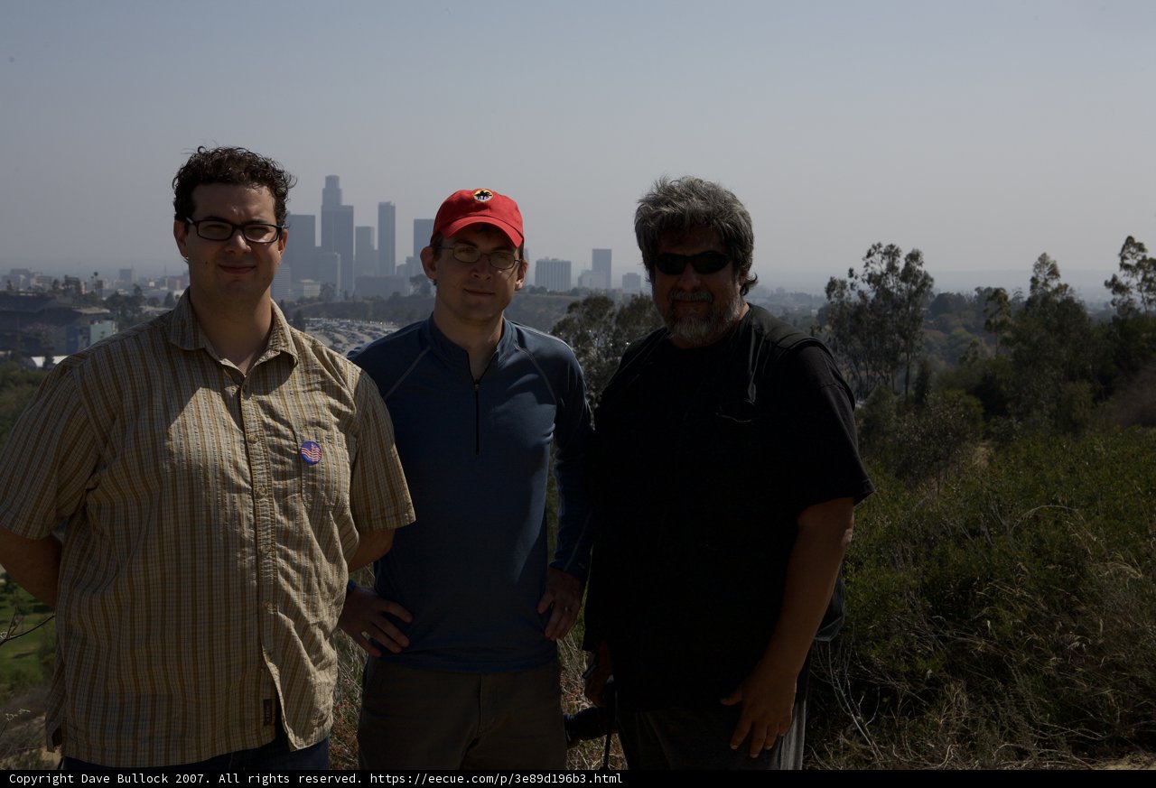 Three Men Enjoying the View from the Hill