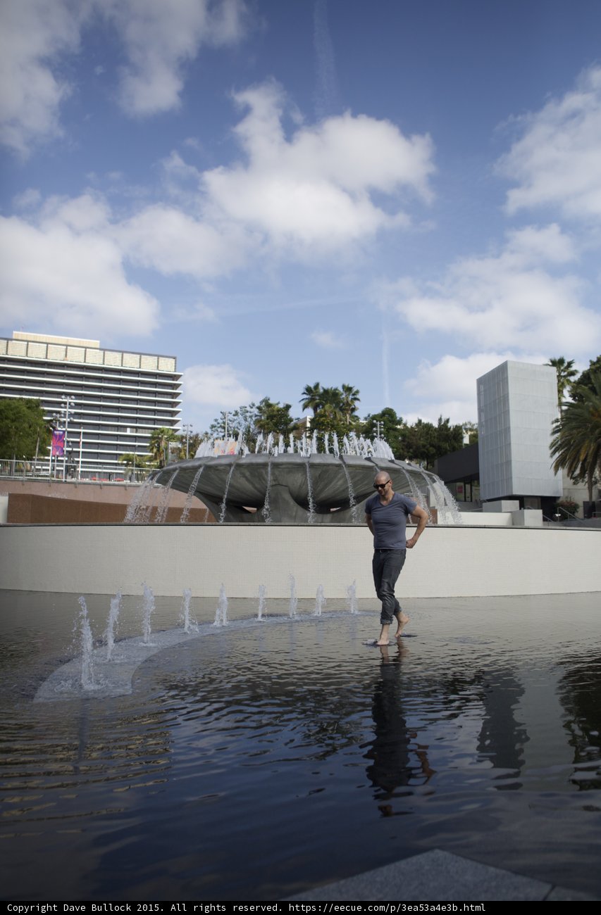 Walking Through Fountain