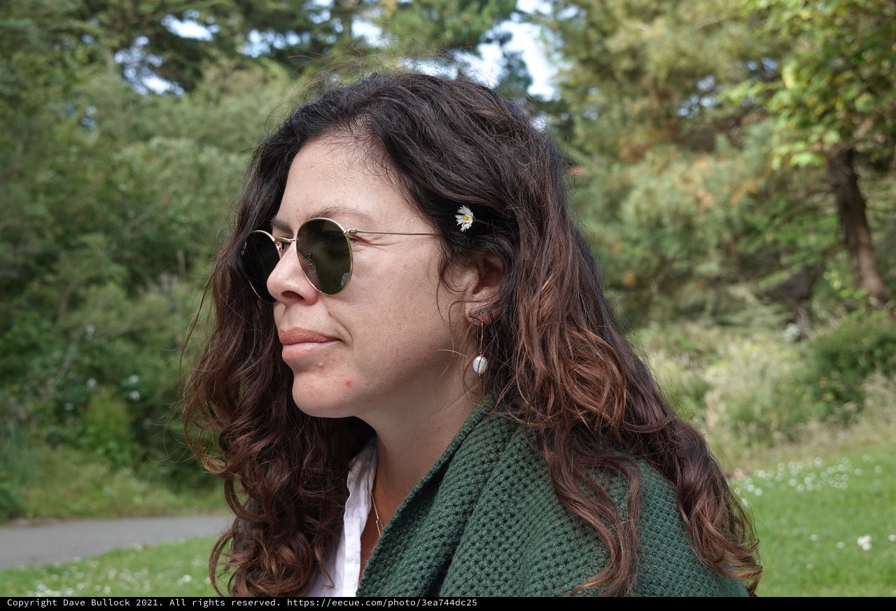 Woman in Green Cardigan Enjoying Nature