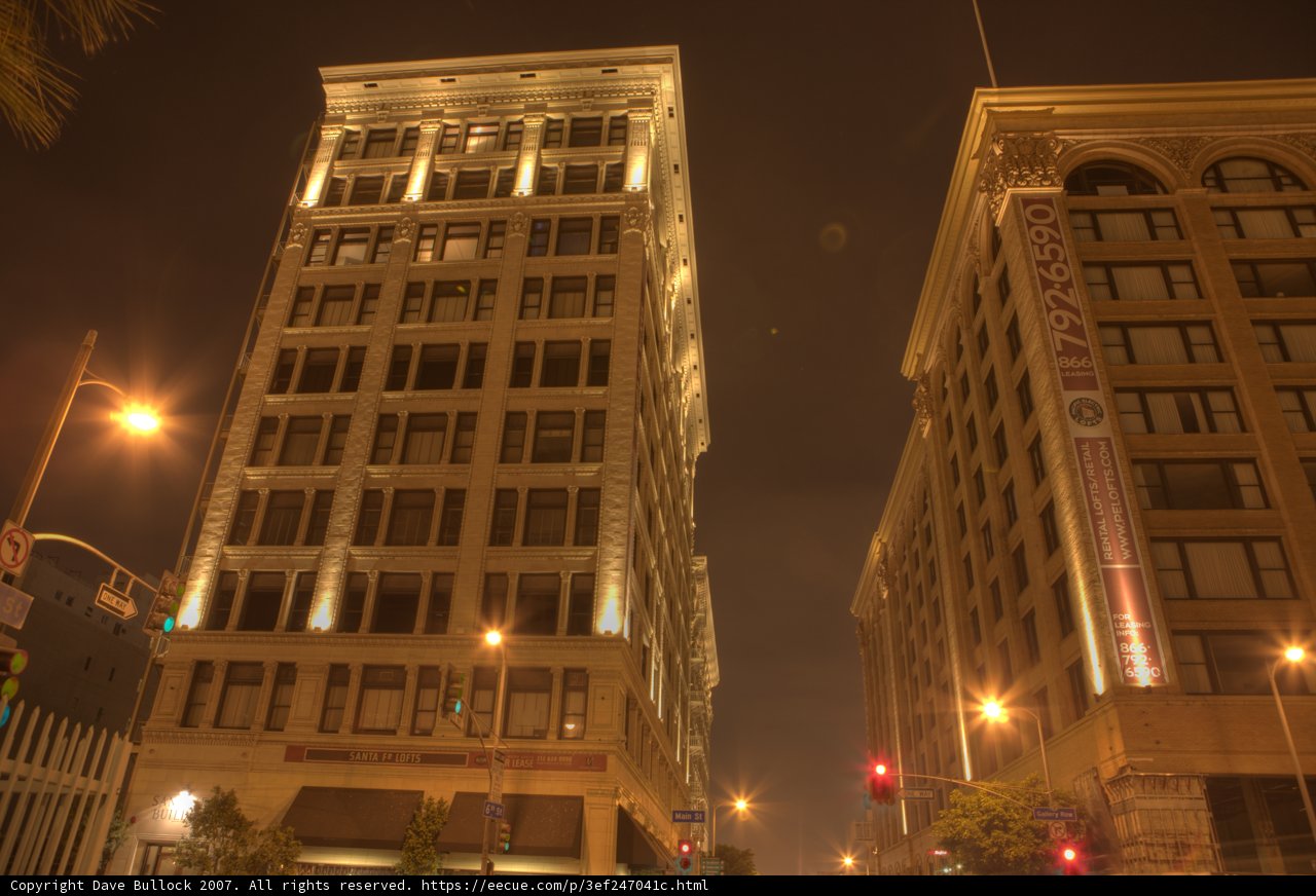 Illuminated Skyscraper in the Busy City