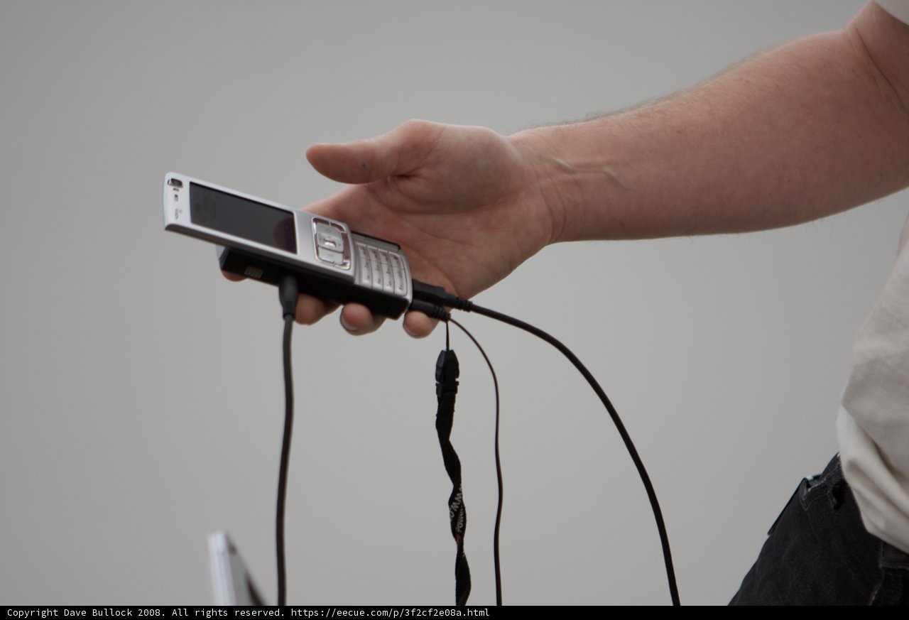 Man with a Corded Cell Phone