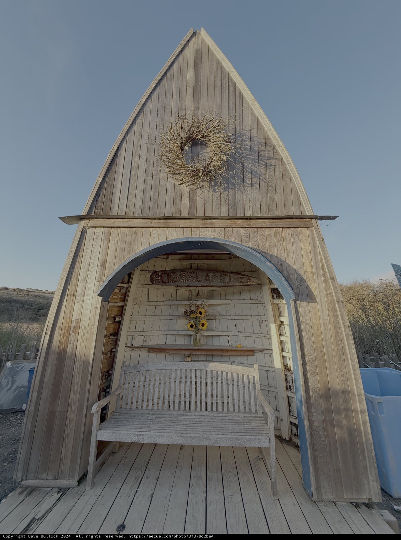 Rustic Wooden Beach Hut with Nautical Charm