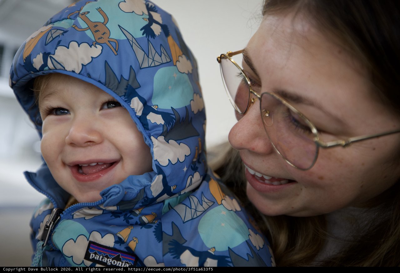 Joyful Winter Moment Between Mother and Child