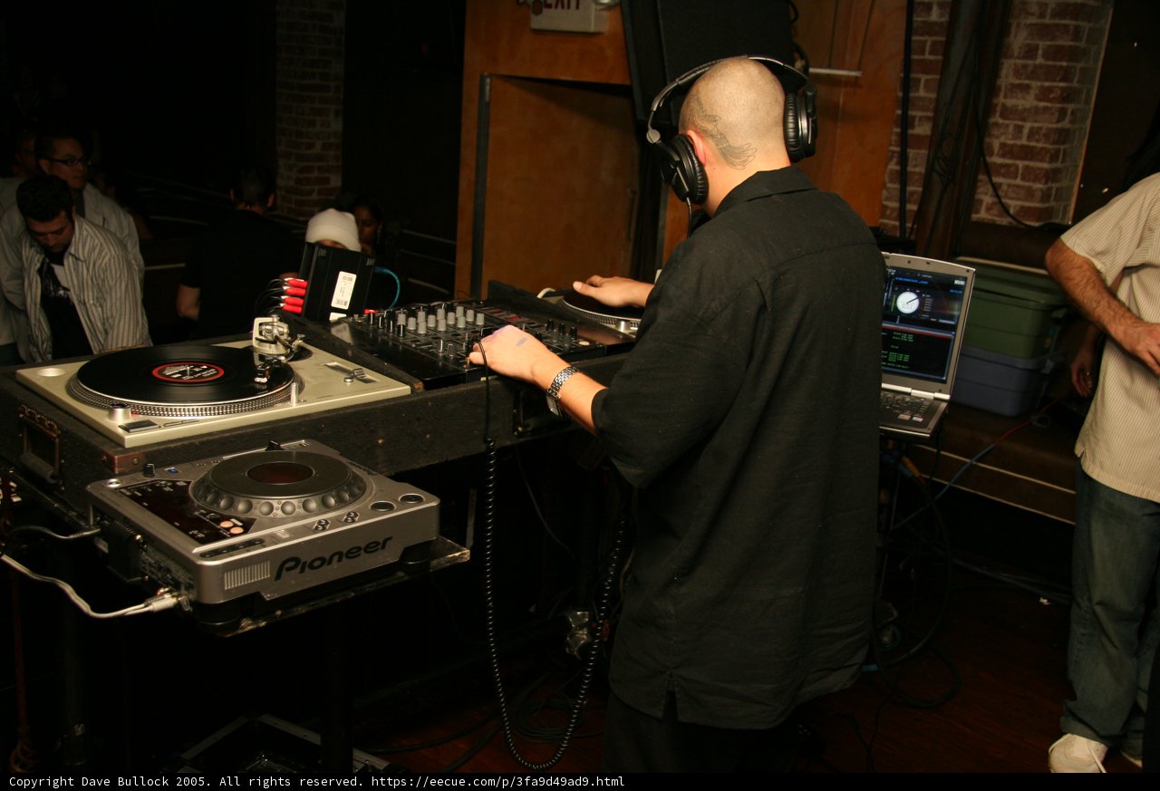 Black Shirt DJ Delivering a Music Extravaganza