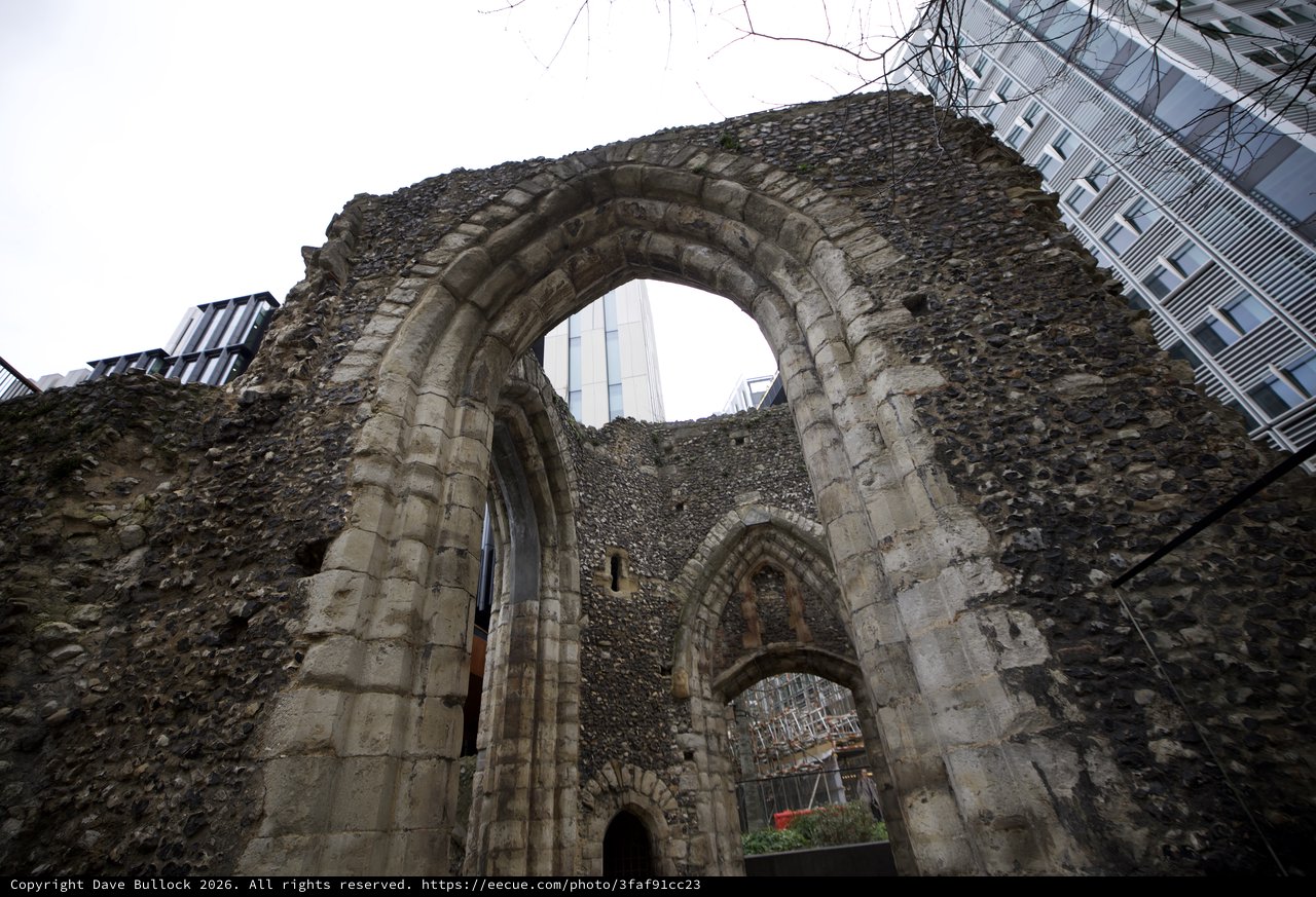 Ancient Church Ruins Framed by Modern Architecture