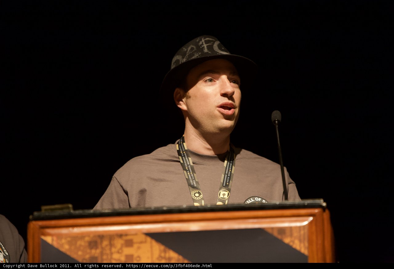 Man in Hat Delivers Powerful Speech at Defcon Podium