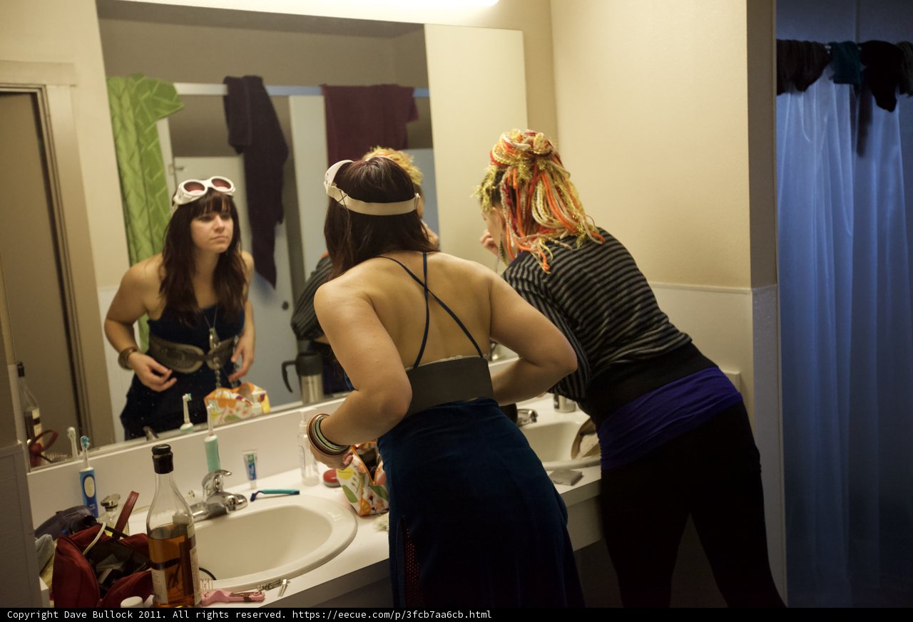 Ladies in Blue: A Moment in the Bathroom