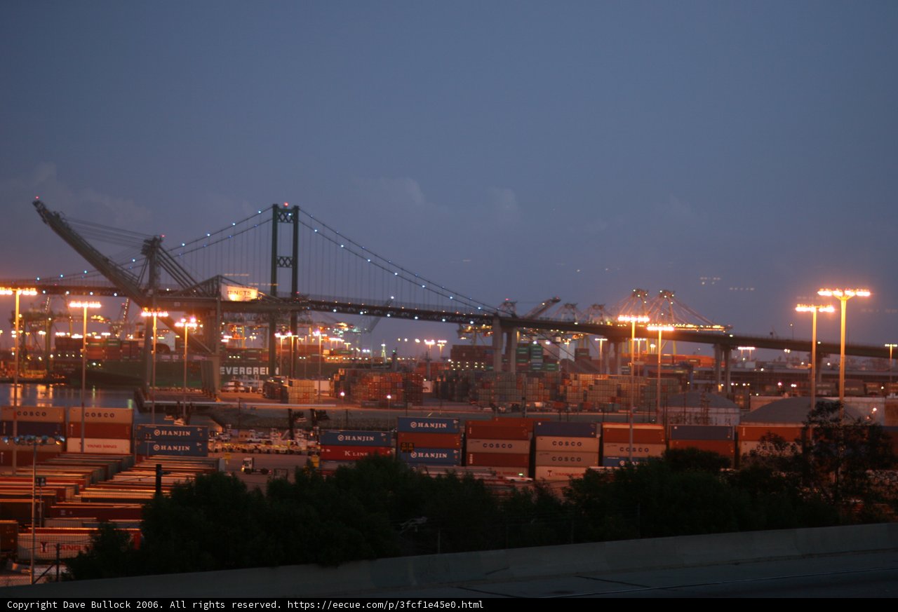 Illuminated Urban Waterfront Bridge