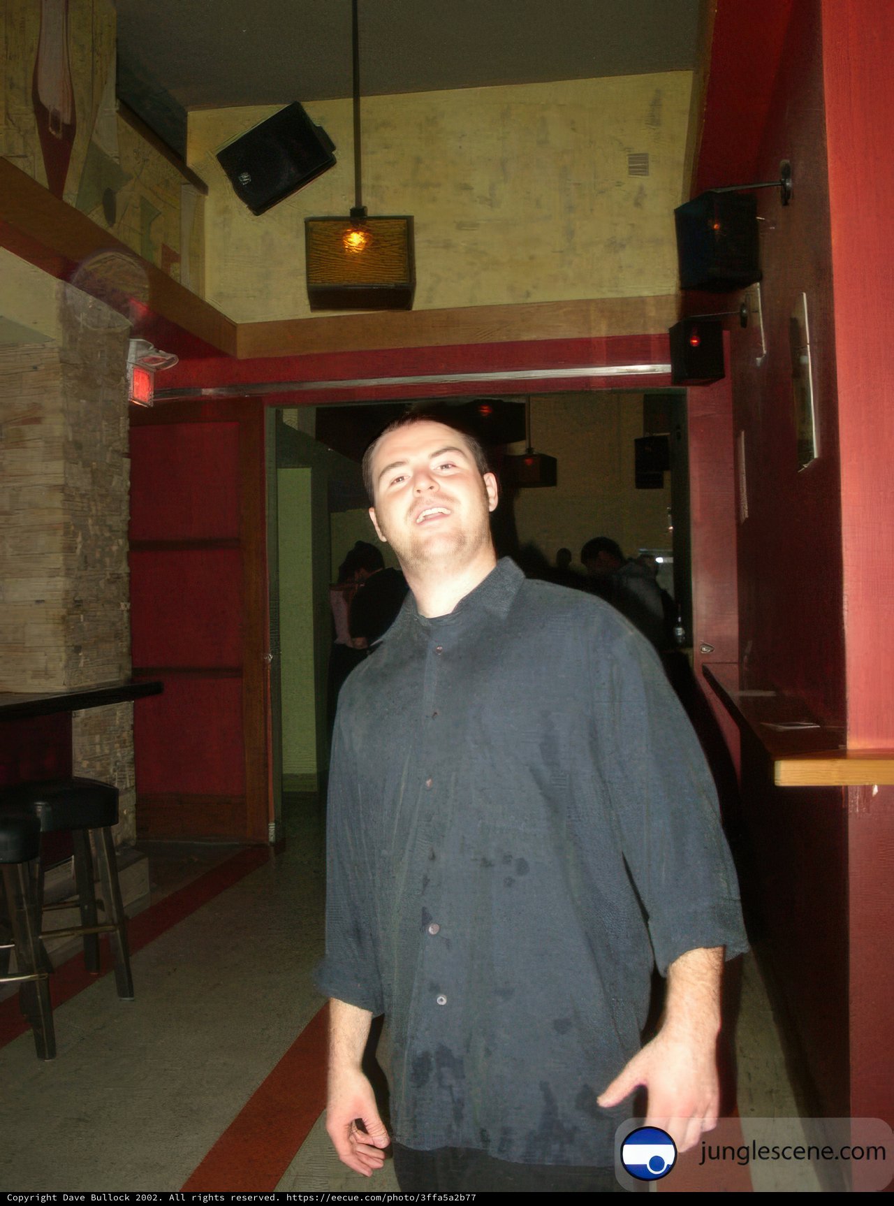 Man enjoying his drink in a cozy pub