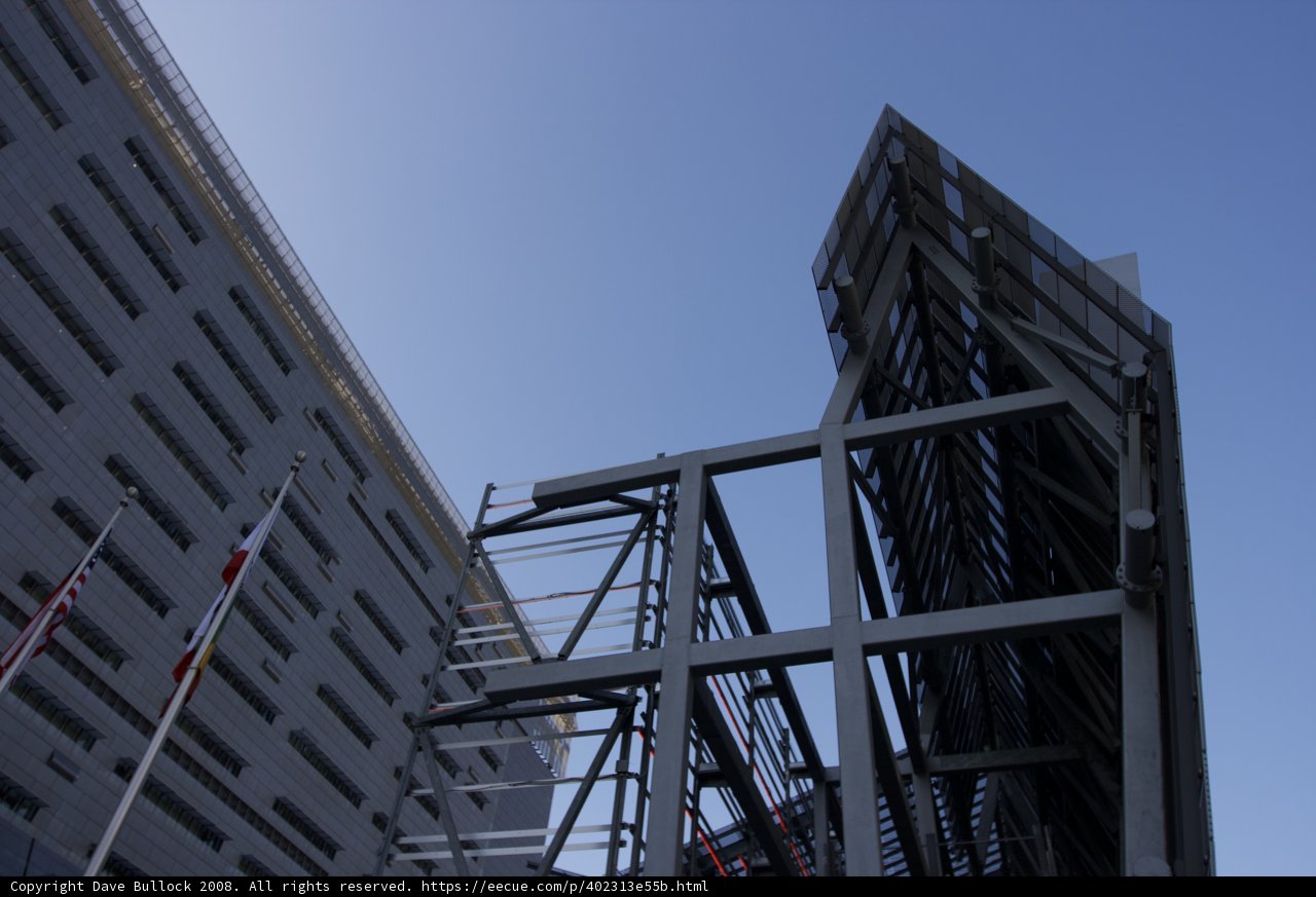 A Gleaming Office Building against the Blue Sky