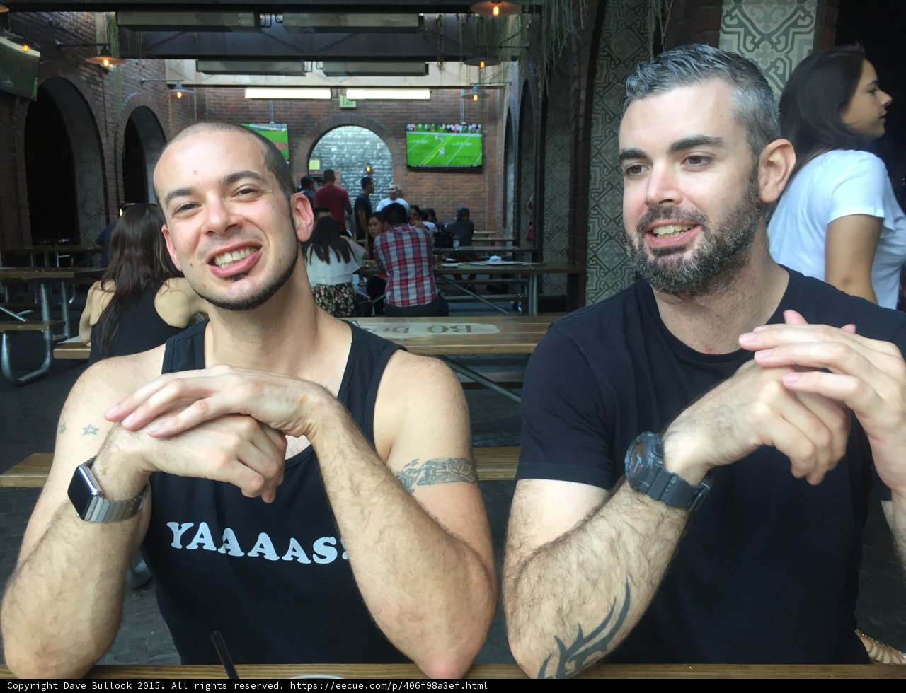 Two Men at a Tattooed Art Show