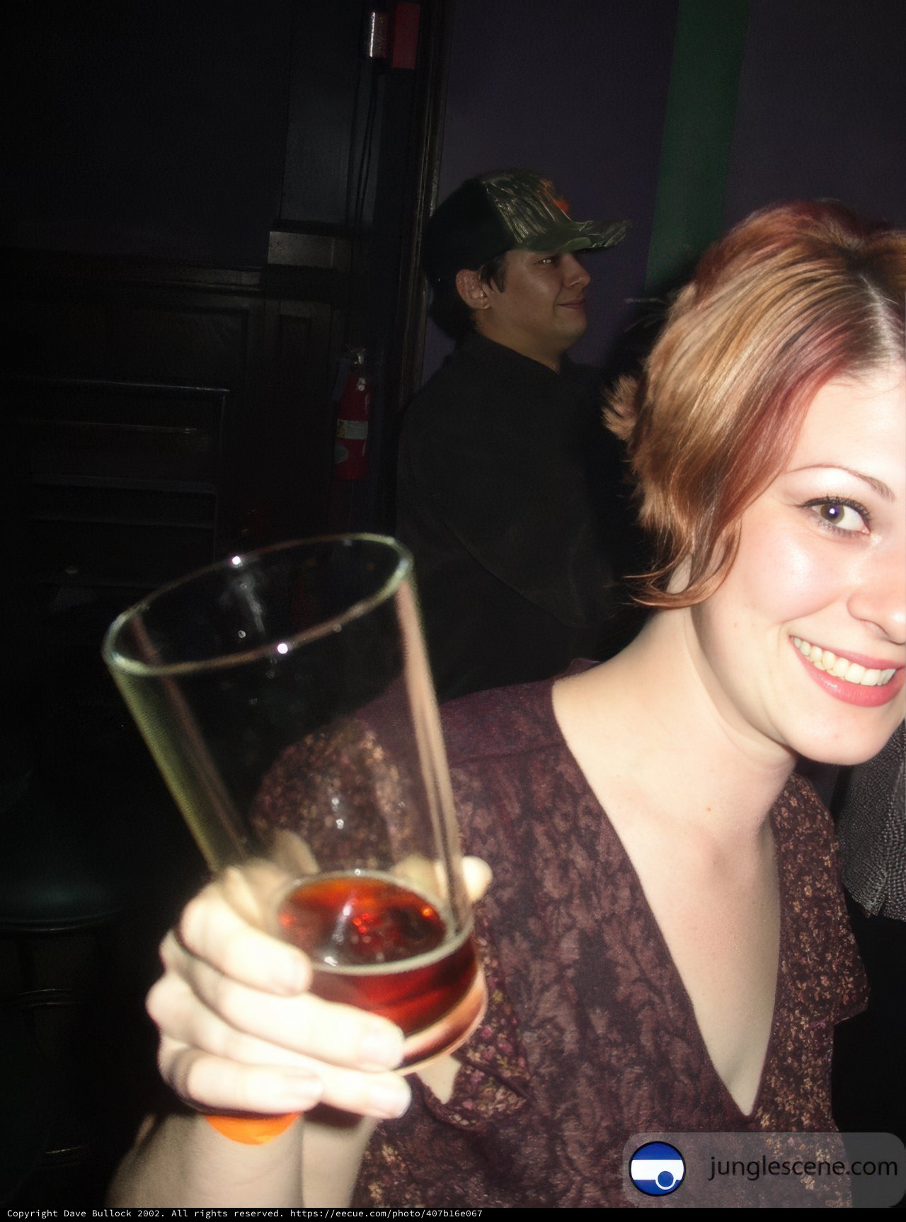 Cheers to the Lady with a Glass of Beer