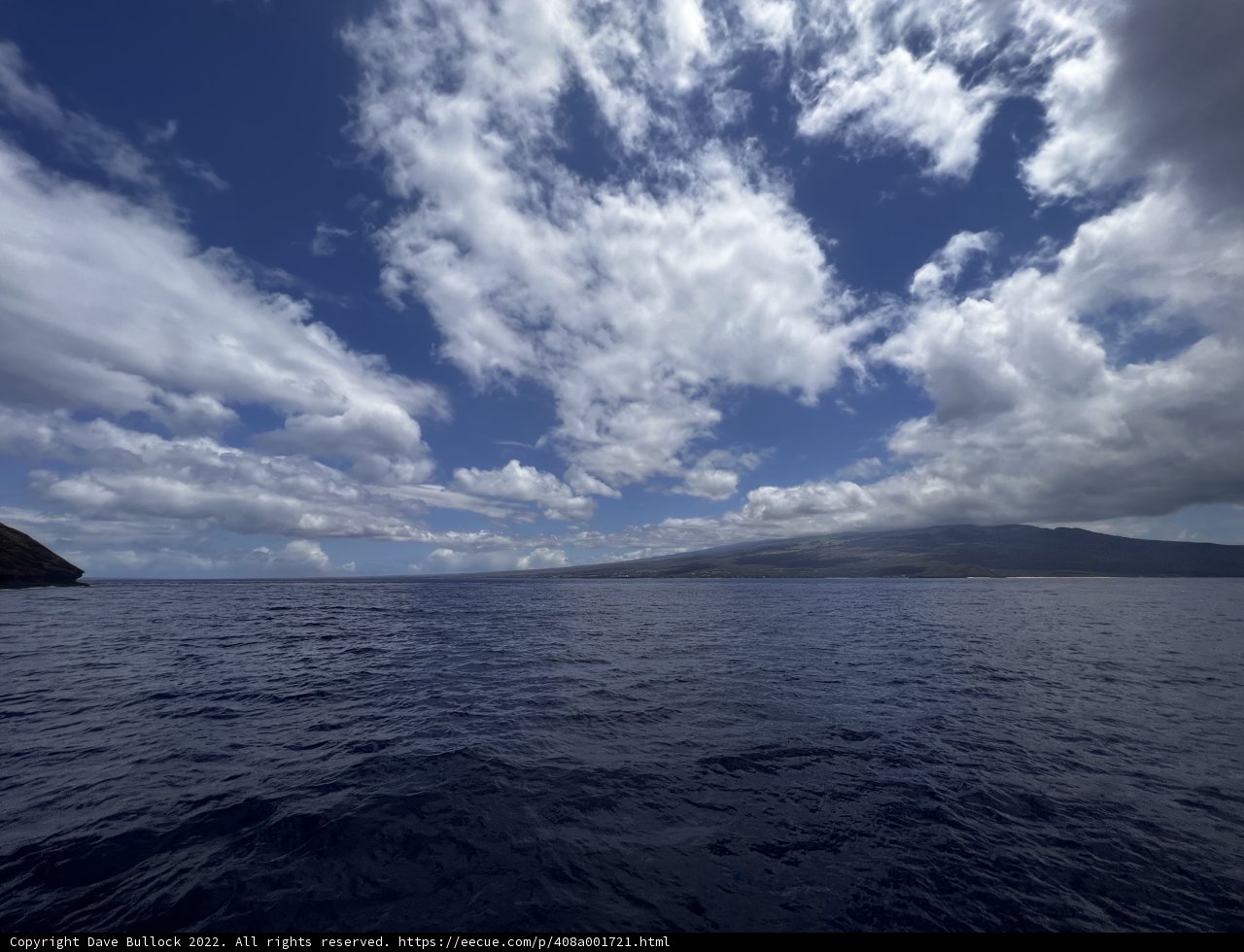 A View of the Churning Ocean Under a Cloudy Sky