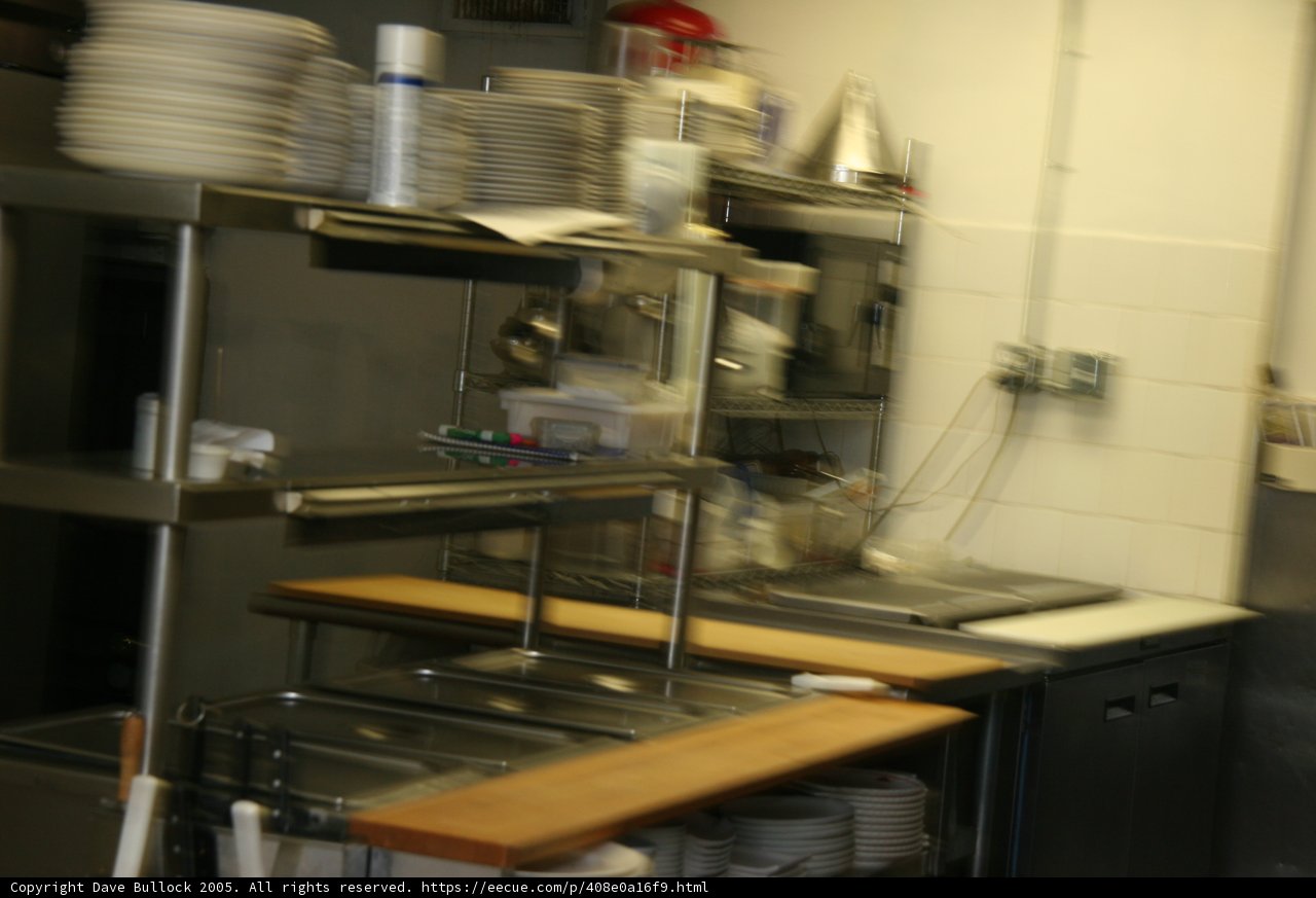 Kitchen Cabinets Overflowing with Dishware