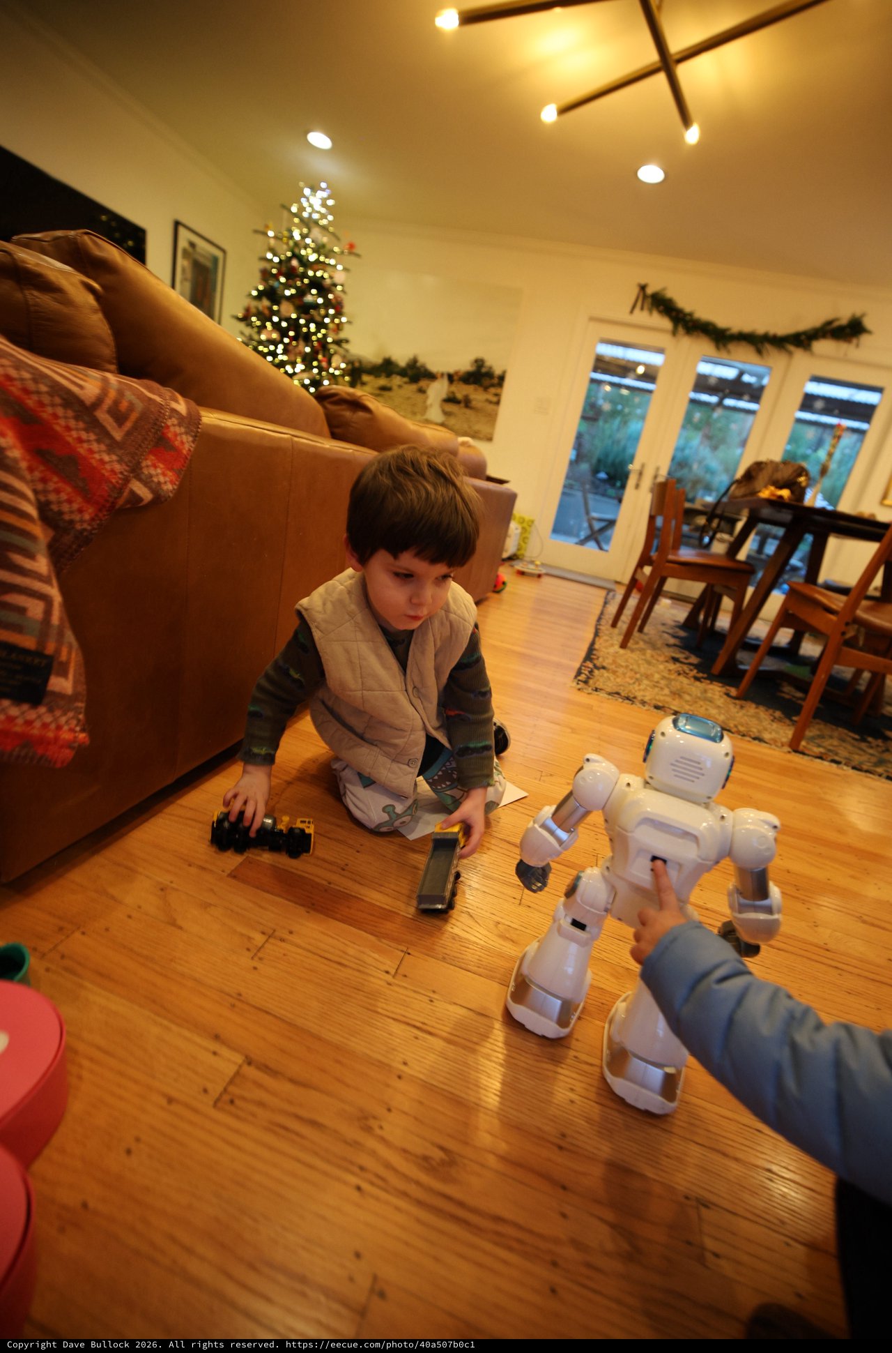 Child Playing with Robot Toys on Christmas Eve