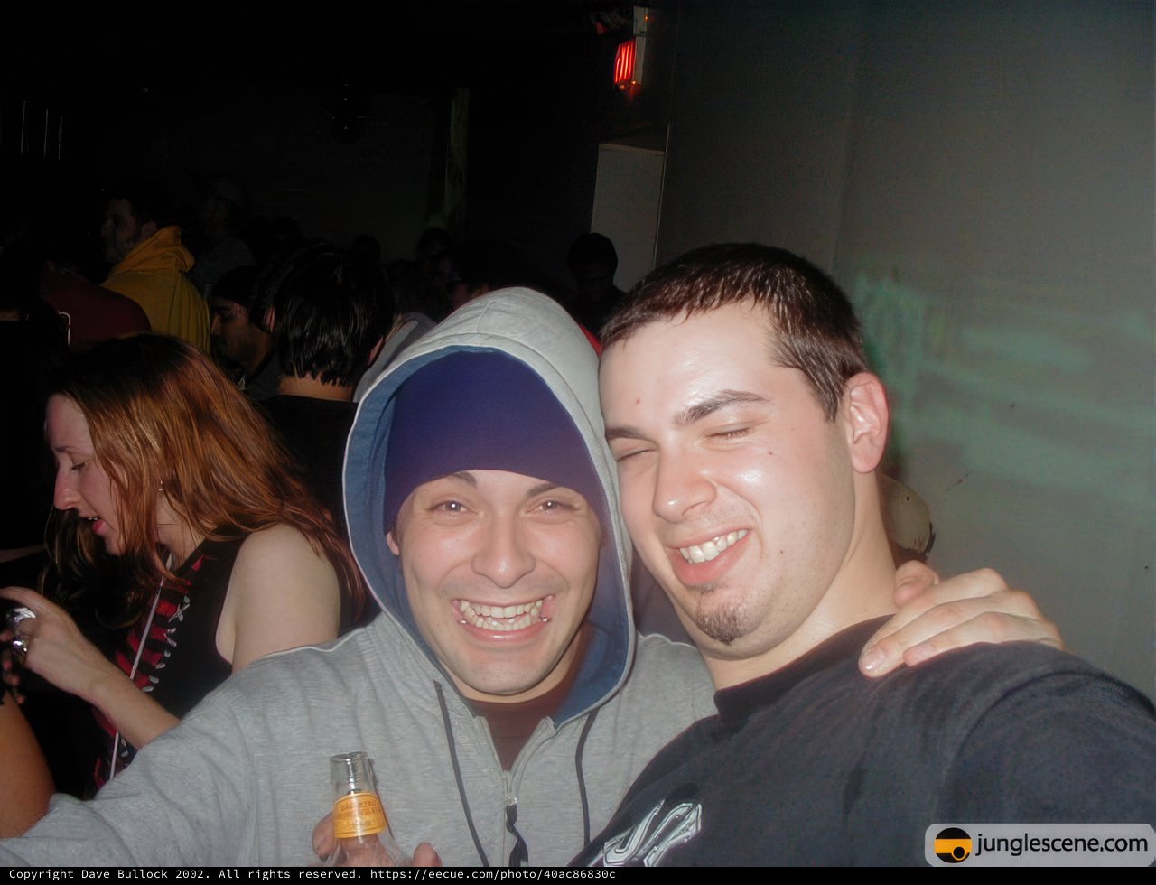 Smiling Men with Drinks