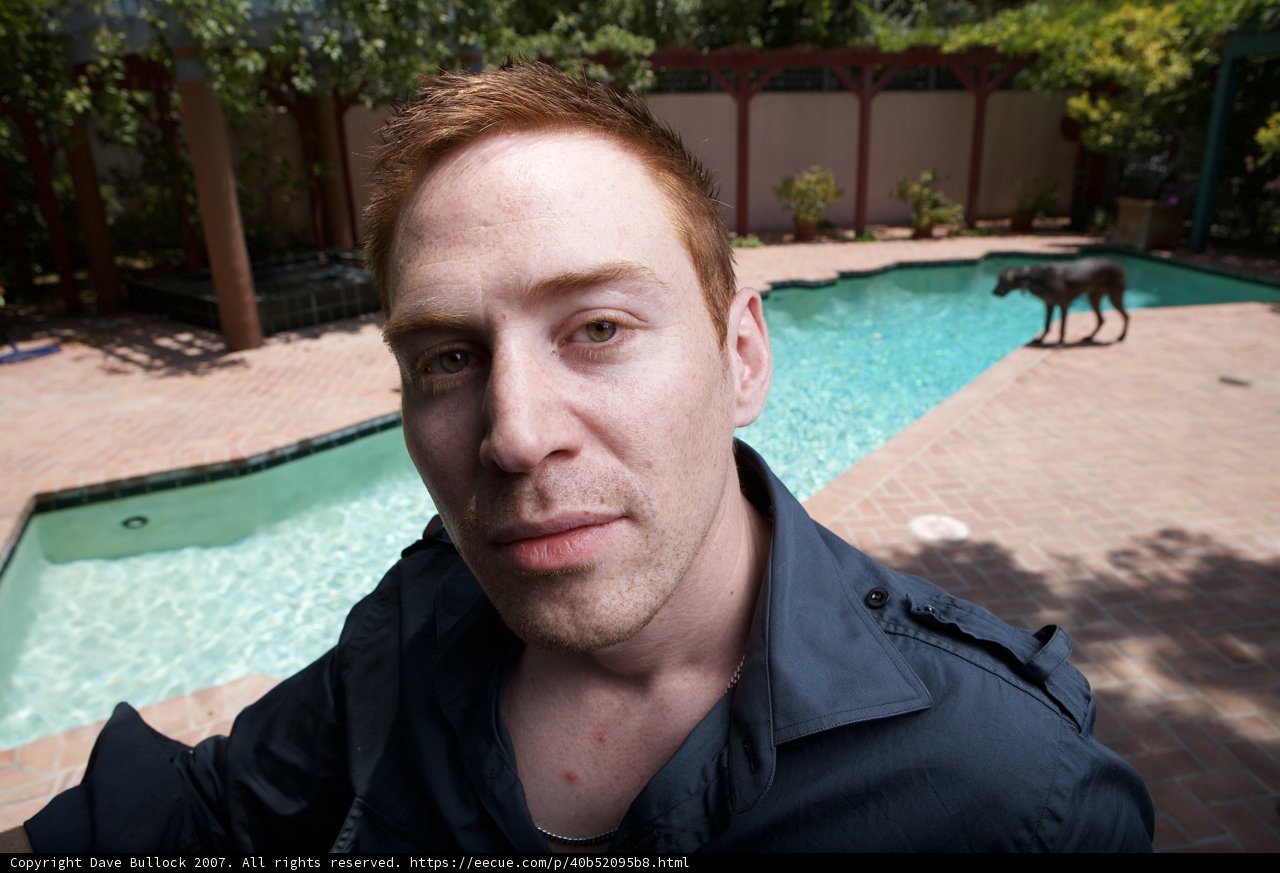Man and His Best Friend by the Pool