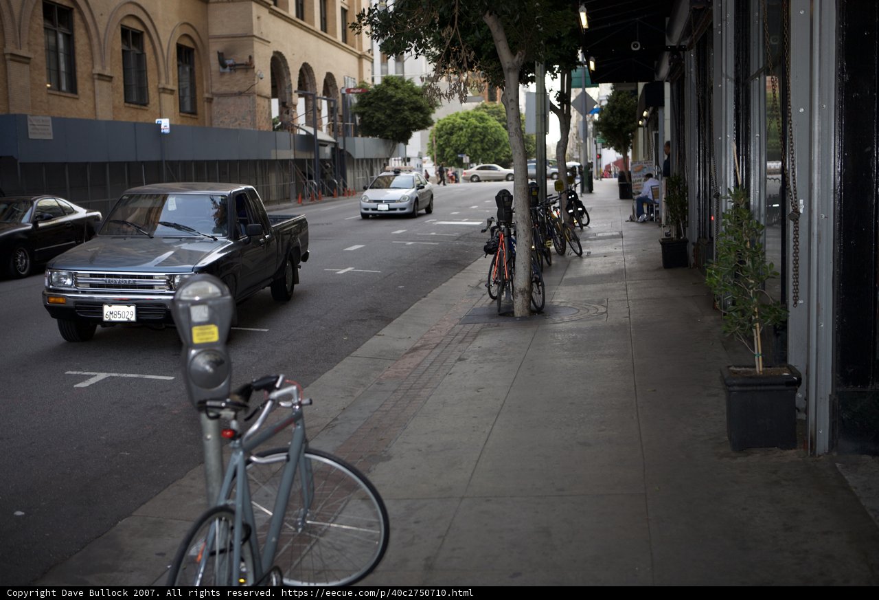 Parked Bike on Busy Sidewalk