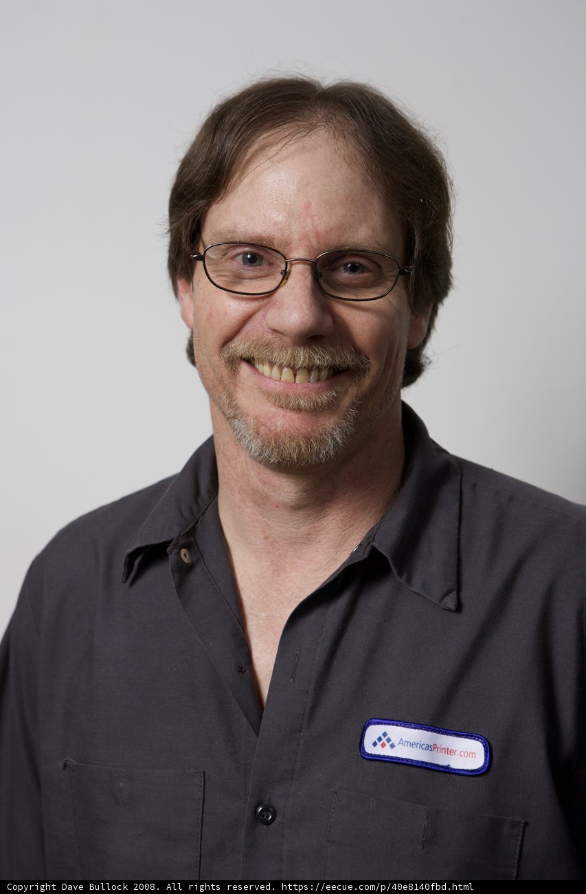 The Smiling Man in Gray
