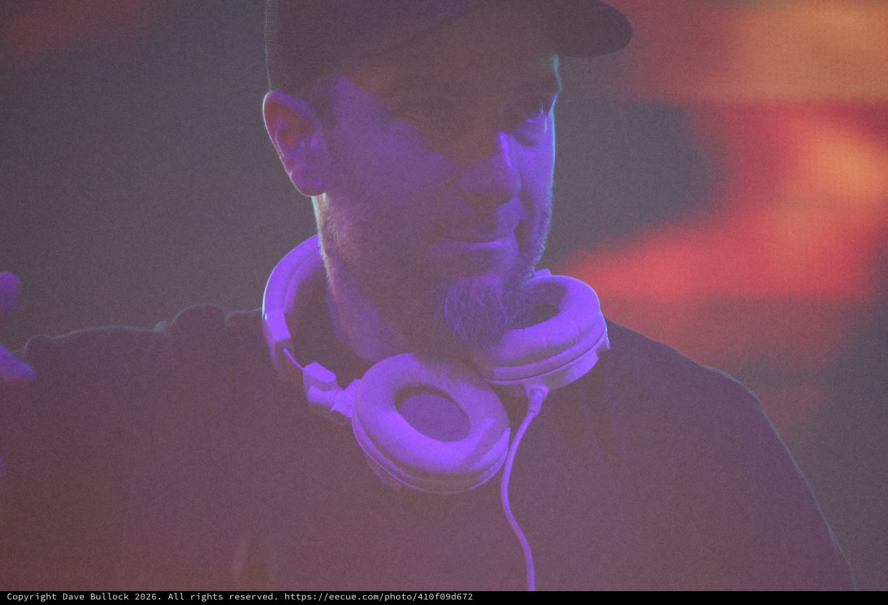 DJ Lost in Sound Under Purple Club Lights