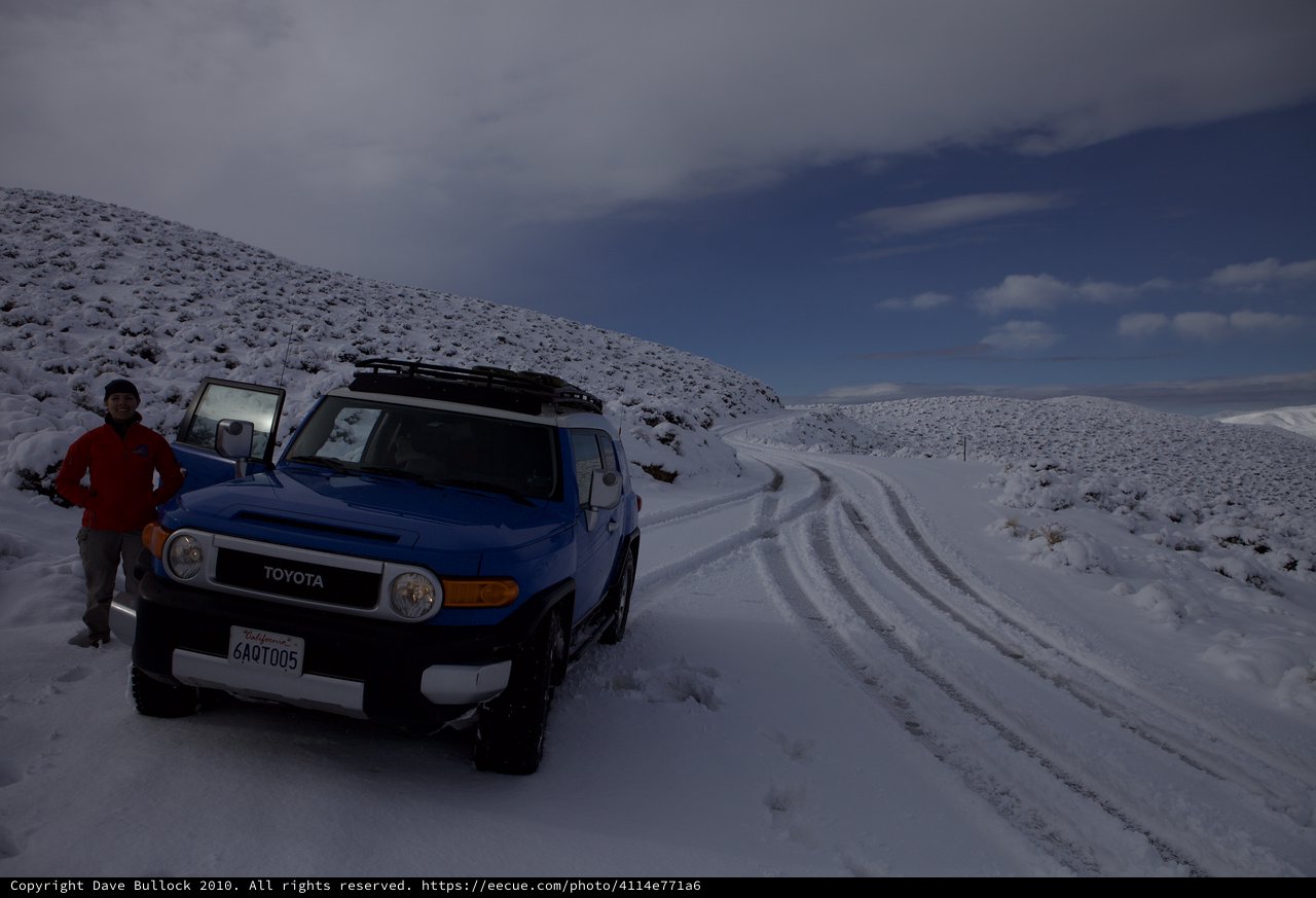 Blue Toyota FJ Cruiser on Snowy Mountain Road