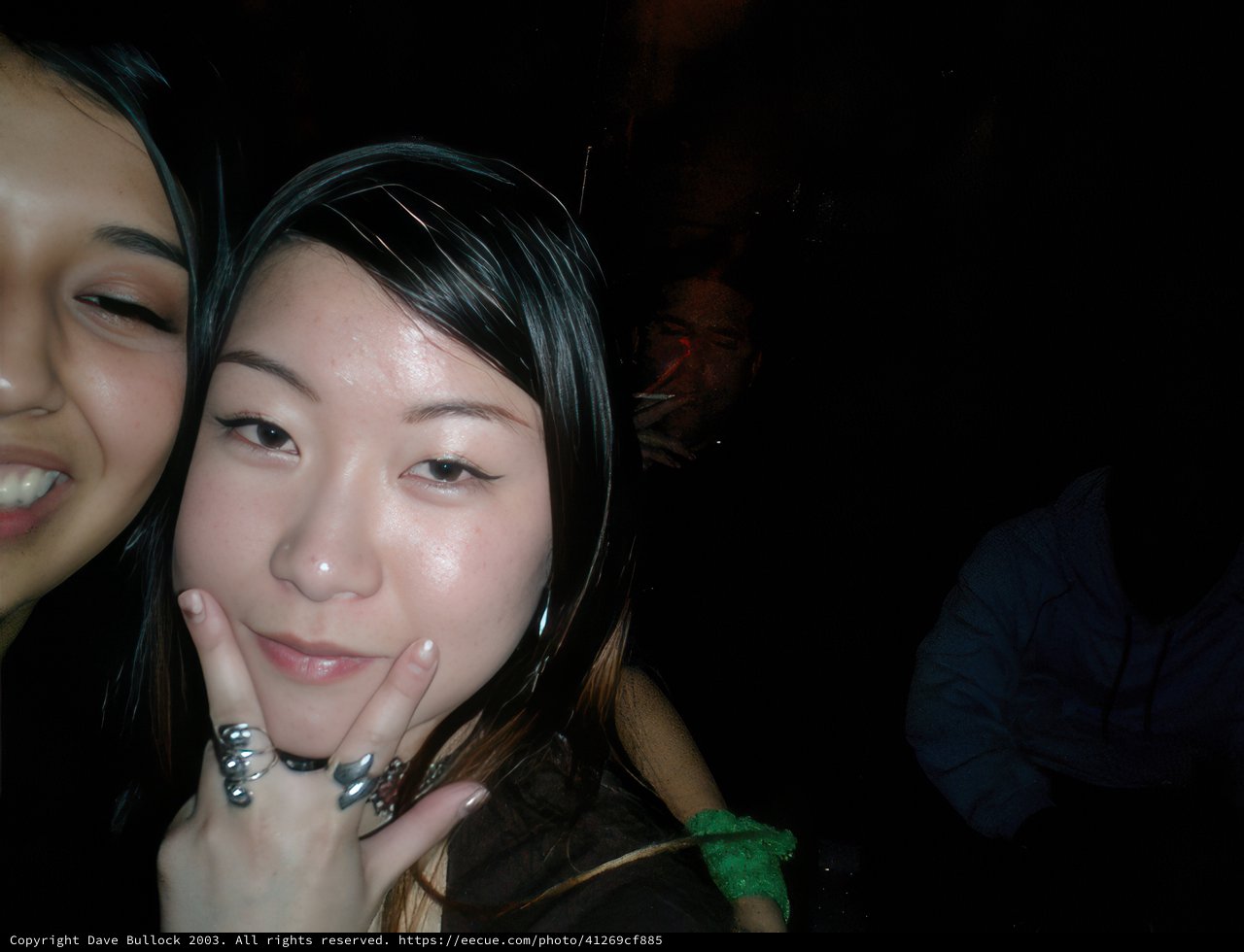 Double Trouble: Two Asian Women Strike a Pose