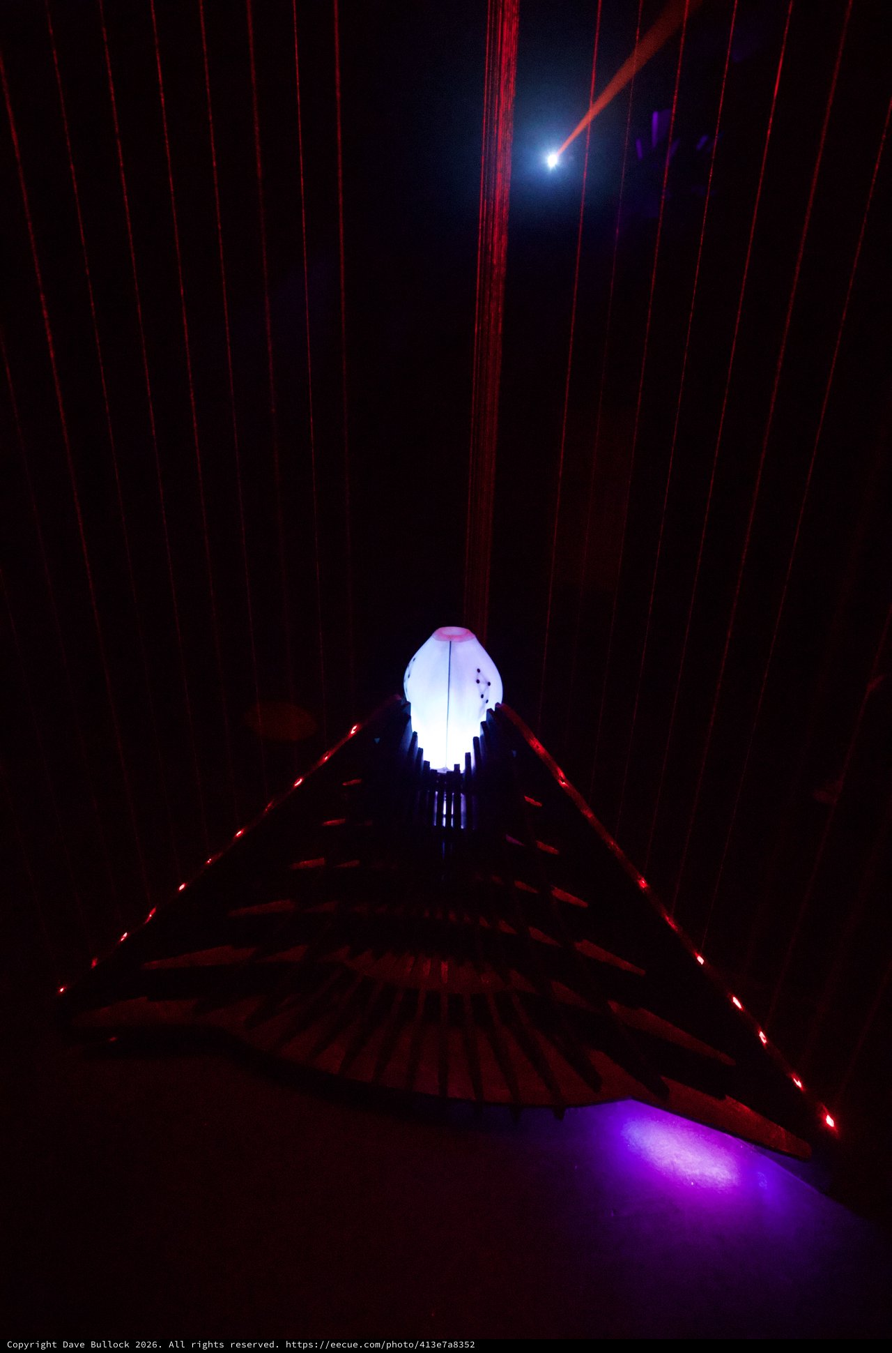 Illuminated Skull Installation with Red Laser Light Patterns