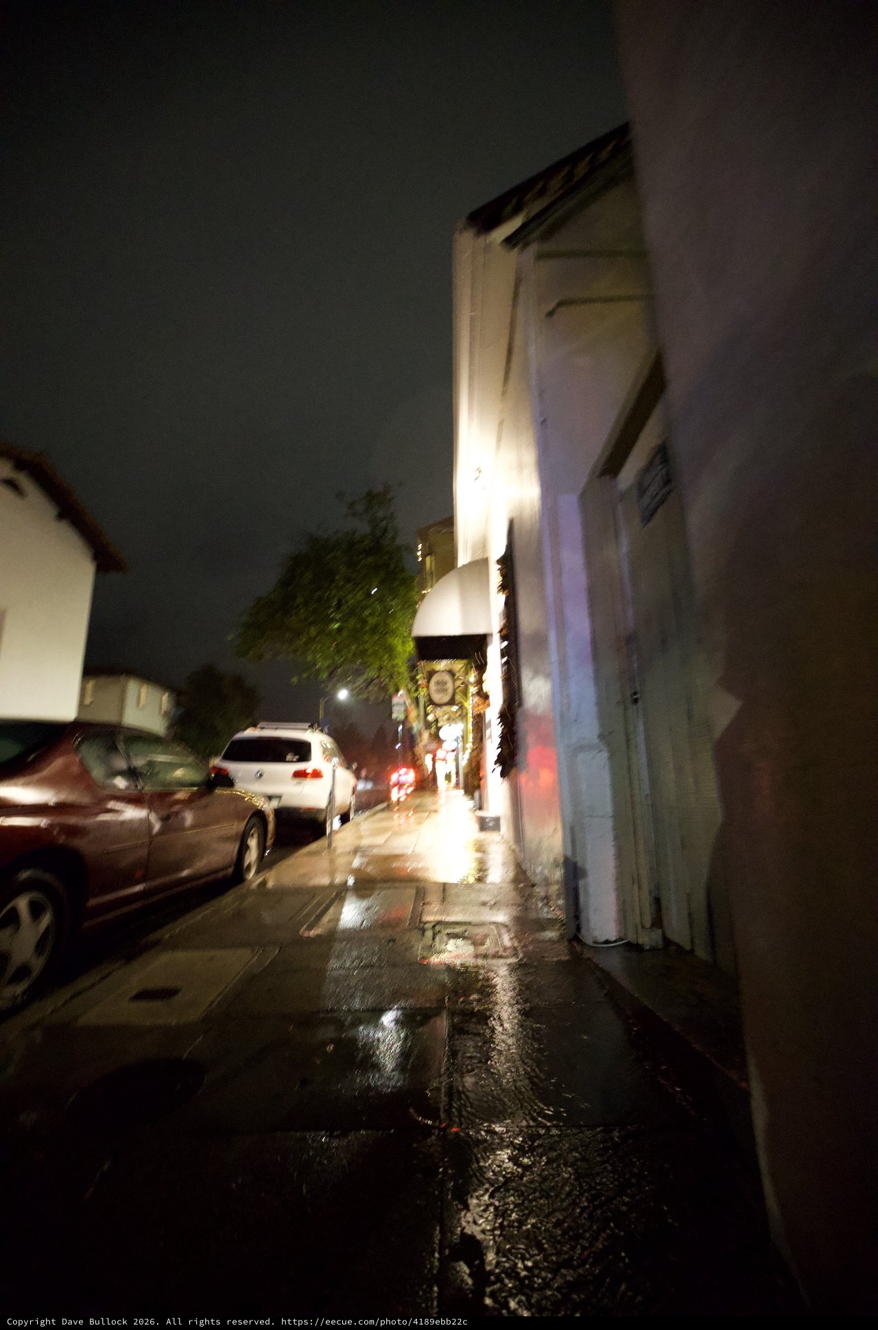 Rainy Night on a Narrow Urban Street