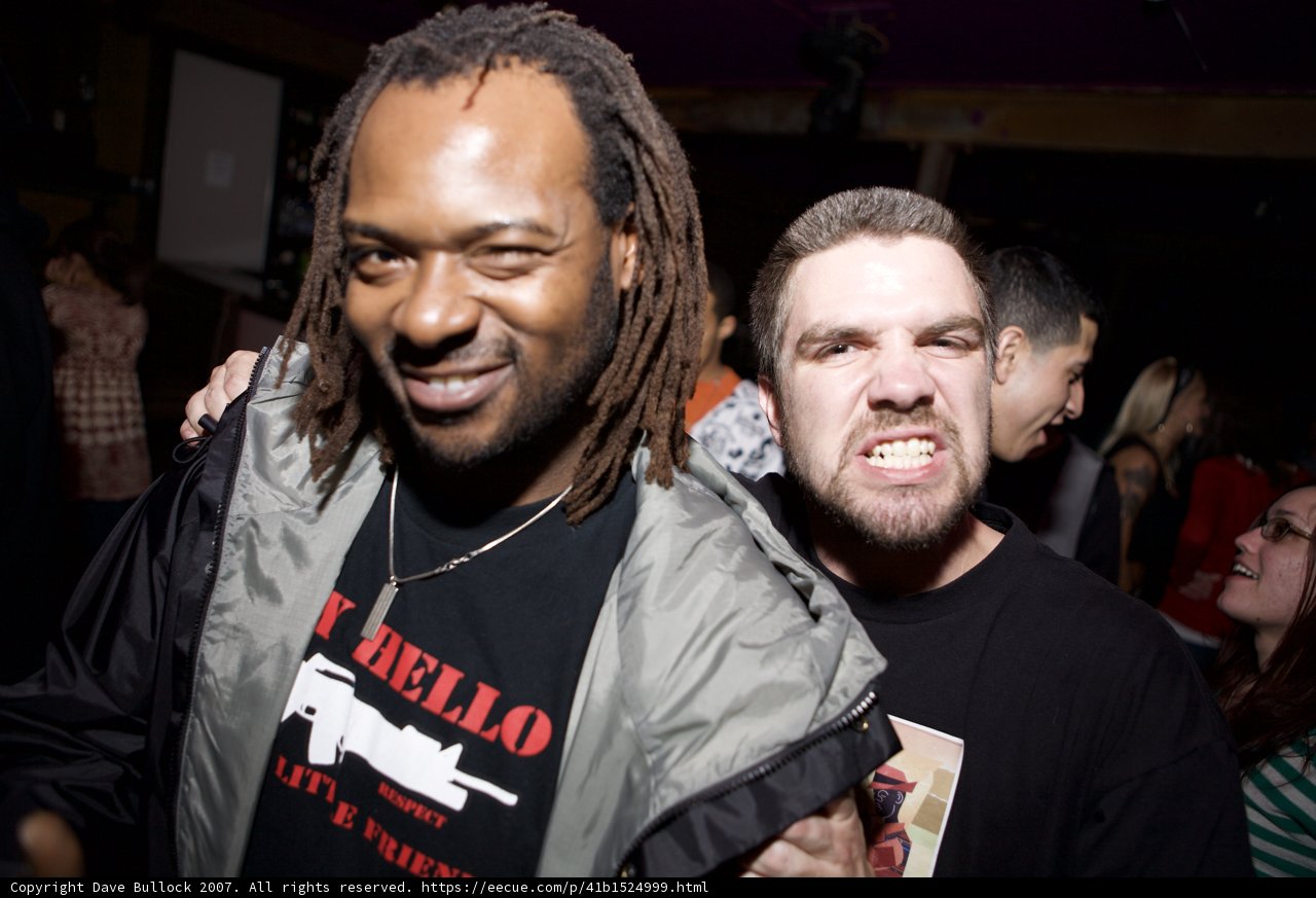 Dreadlocked Duo at Party