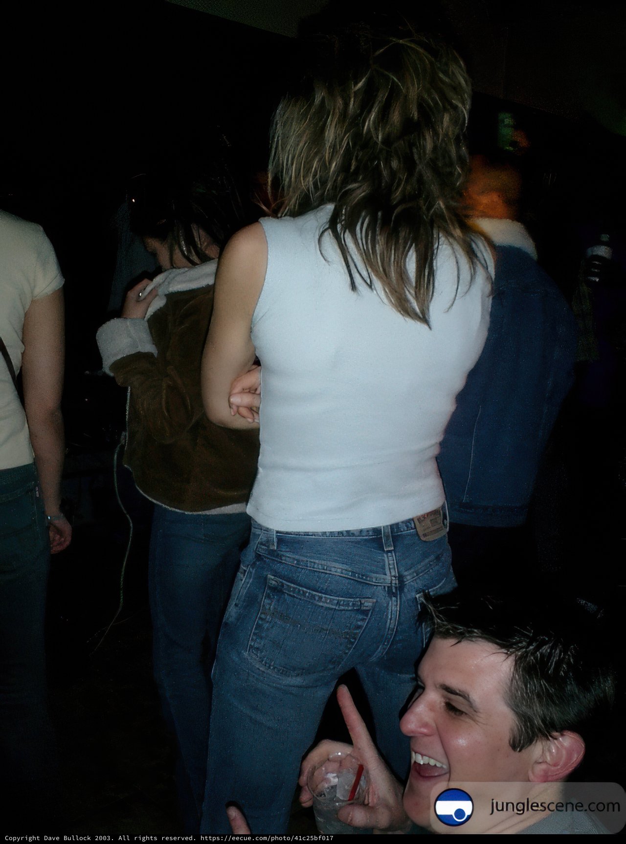 White Shirt and Jeans in a Nightclub Crowd