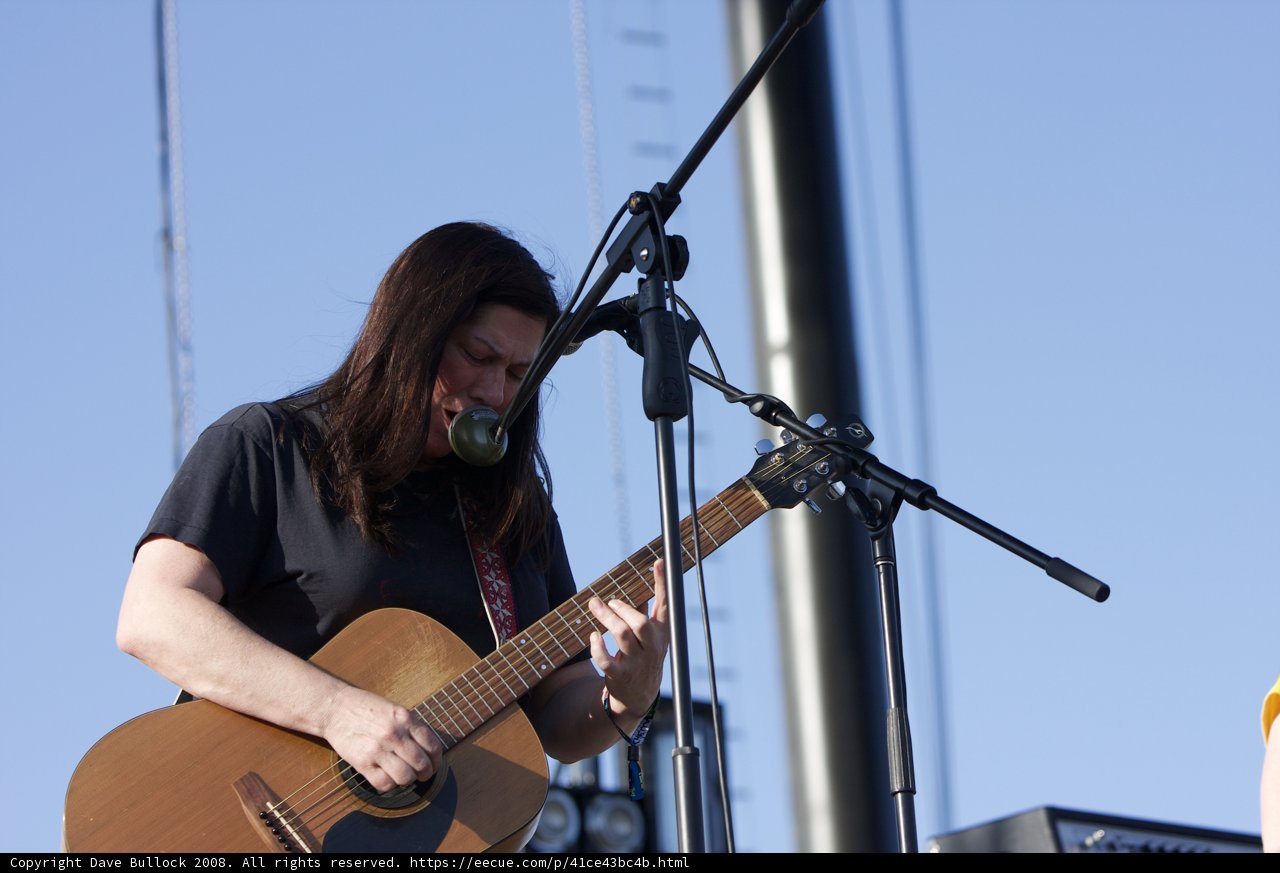 Kim Deal strums her guitar under the Coachella sky