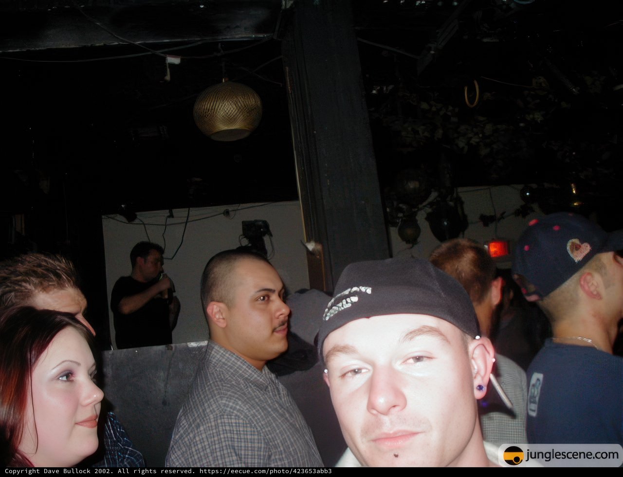 Nightclub Crowd in Baseball Hats