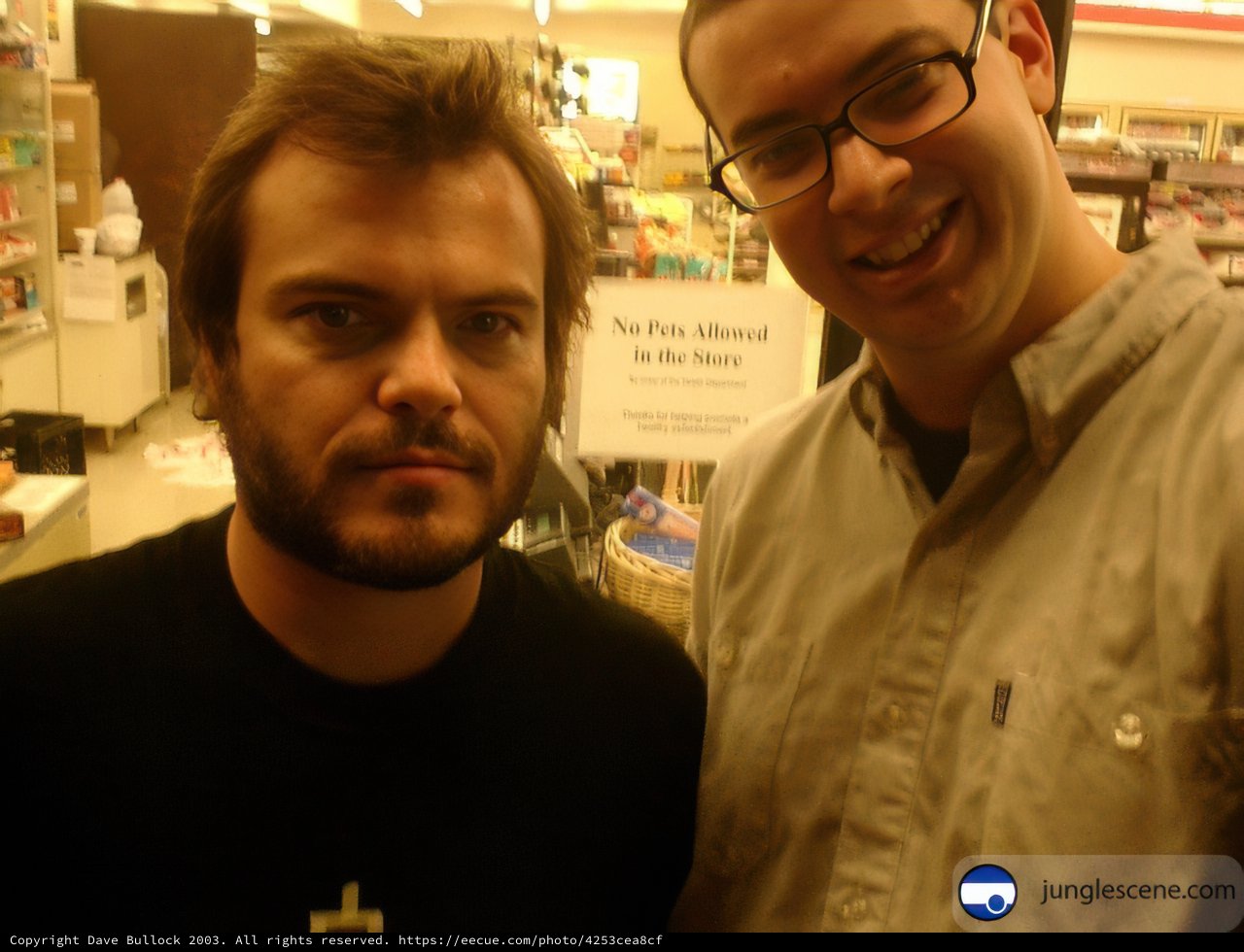 Two Men Checking Out Frames at the Optical Shop