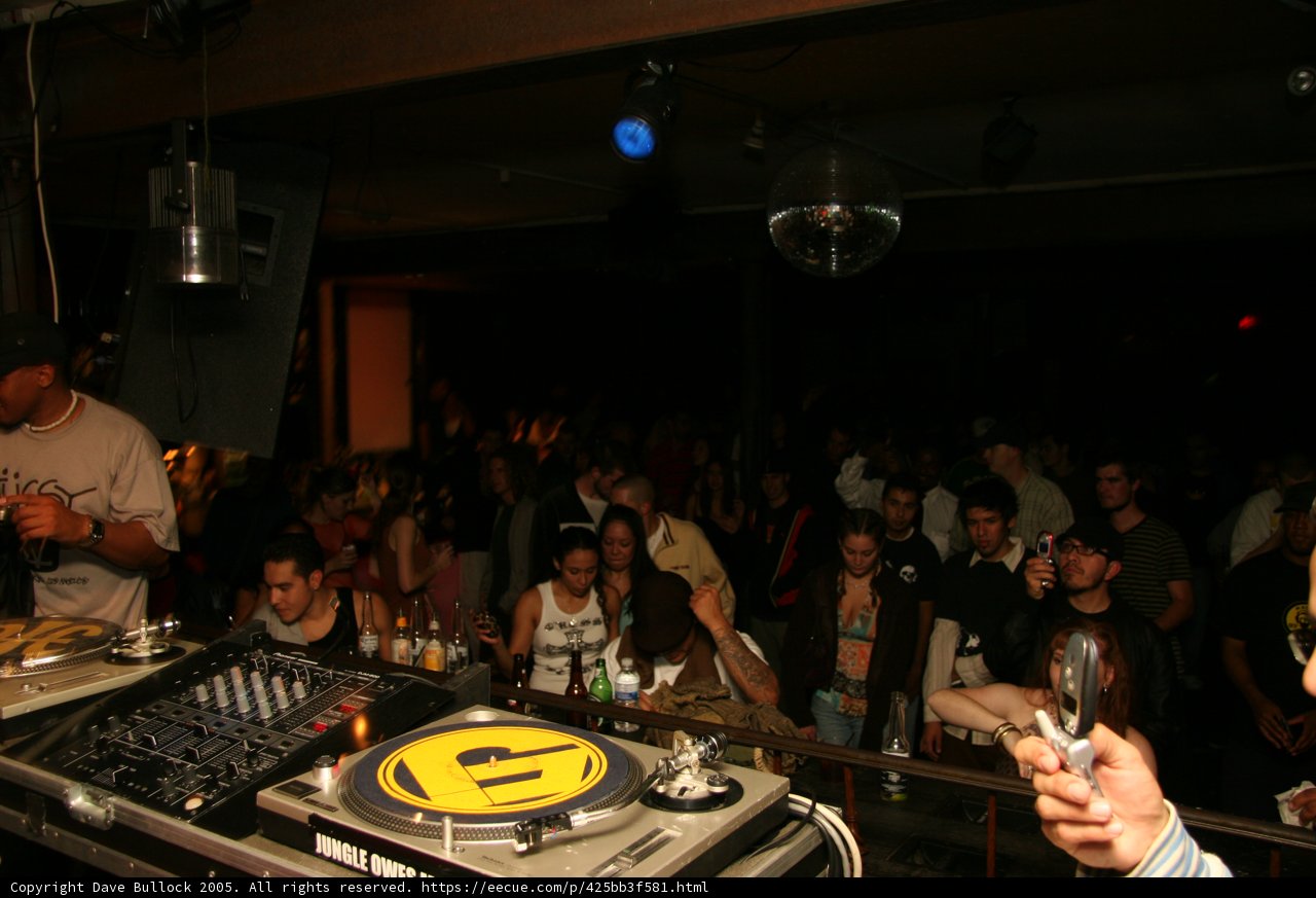 DJ spinning tunes at a lively nightclub