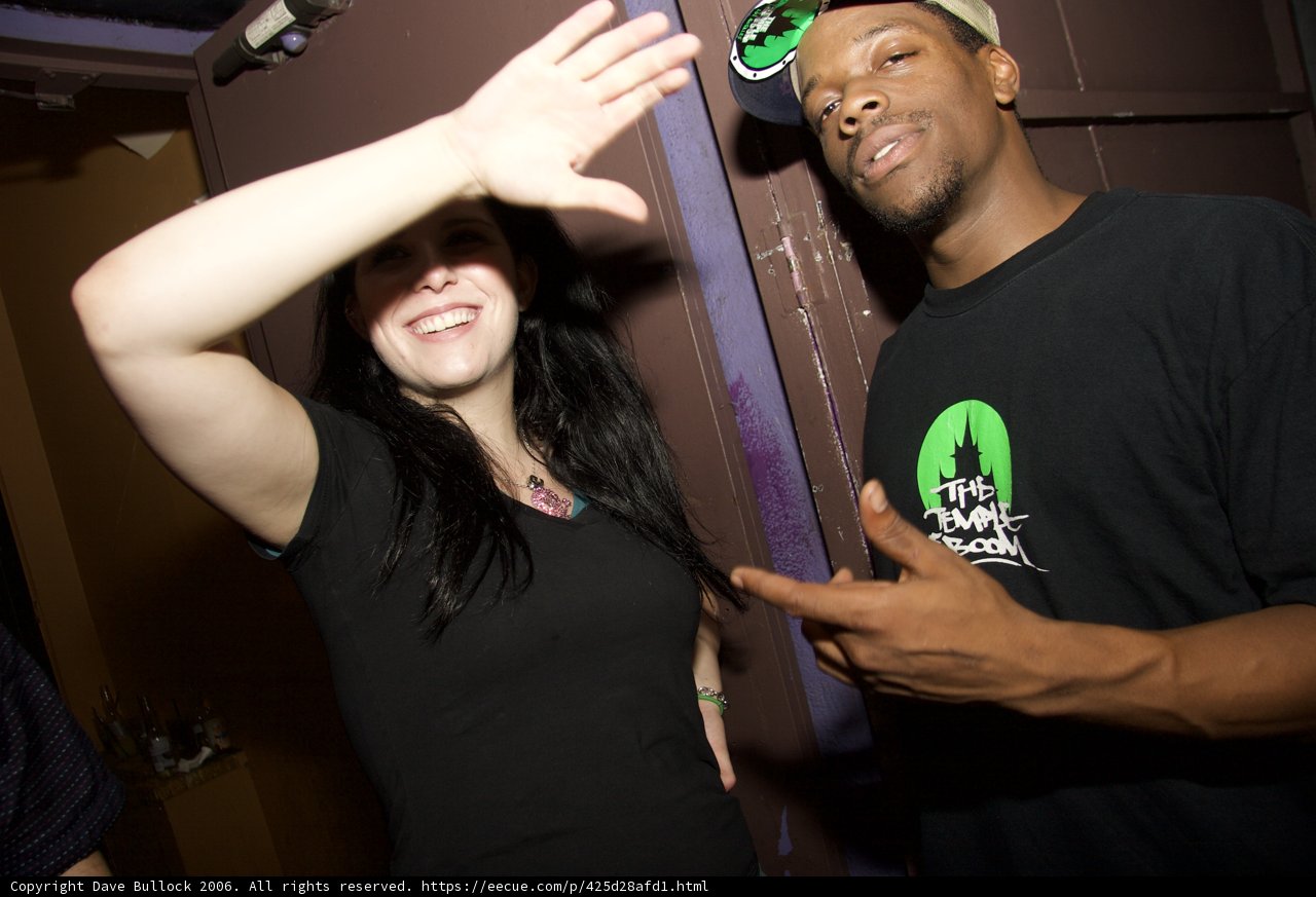 Black Shirted Woman in Urban Nightlife