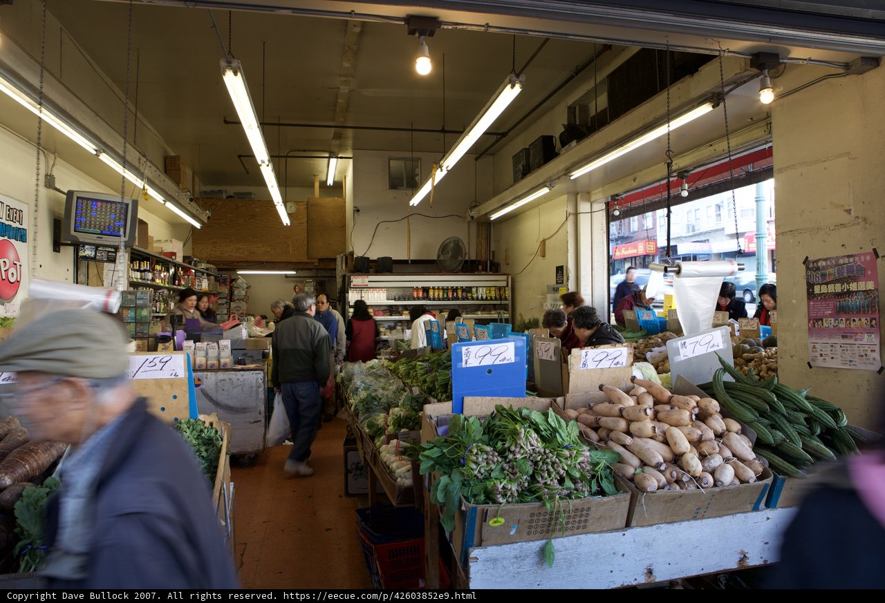 Man Shopping for Produce at Market