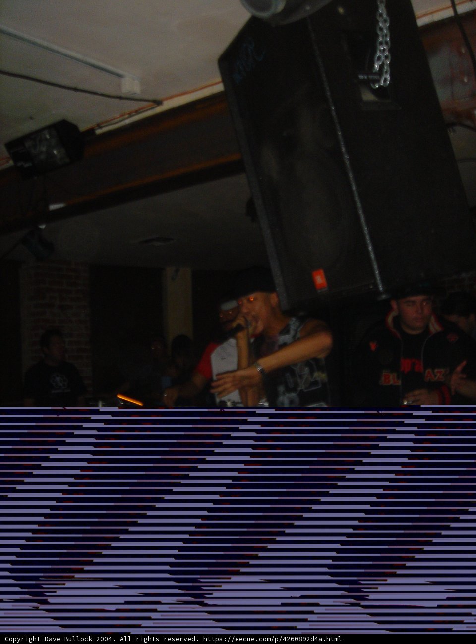 Man mesmerized by speaker at Night Club