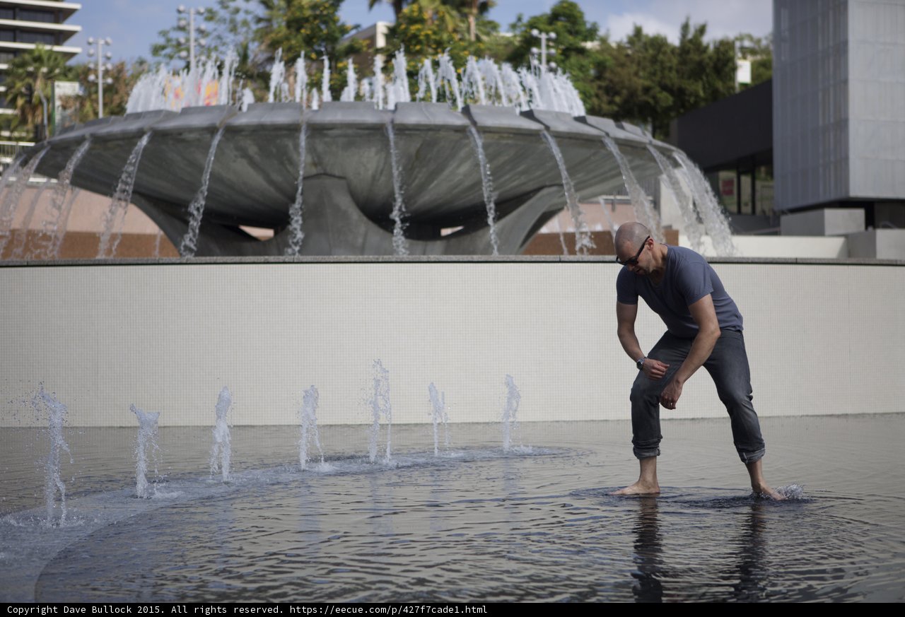Rolling Up Pants in Fountain