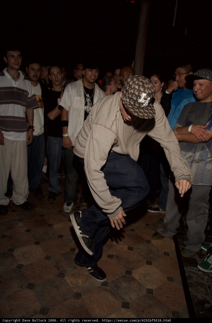 Man in a Stylish Hat Shows Off his Break Dancing Skills