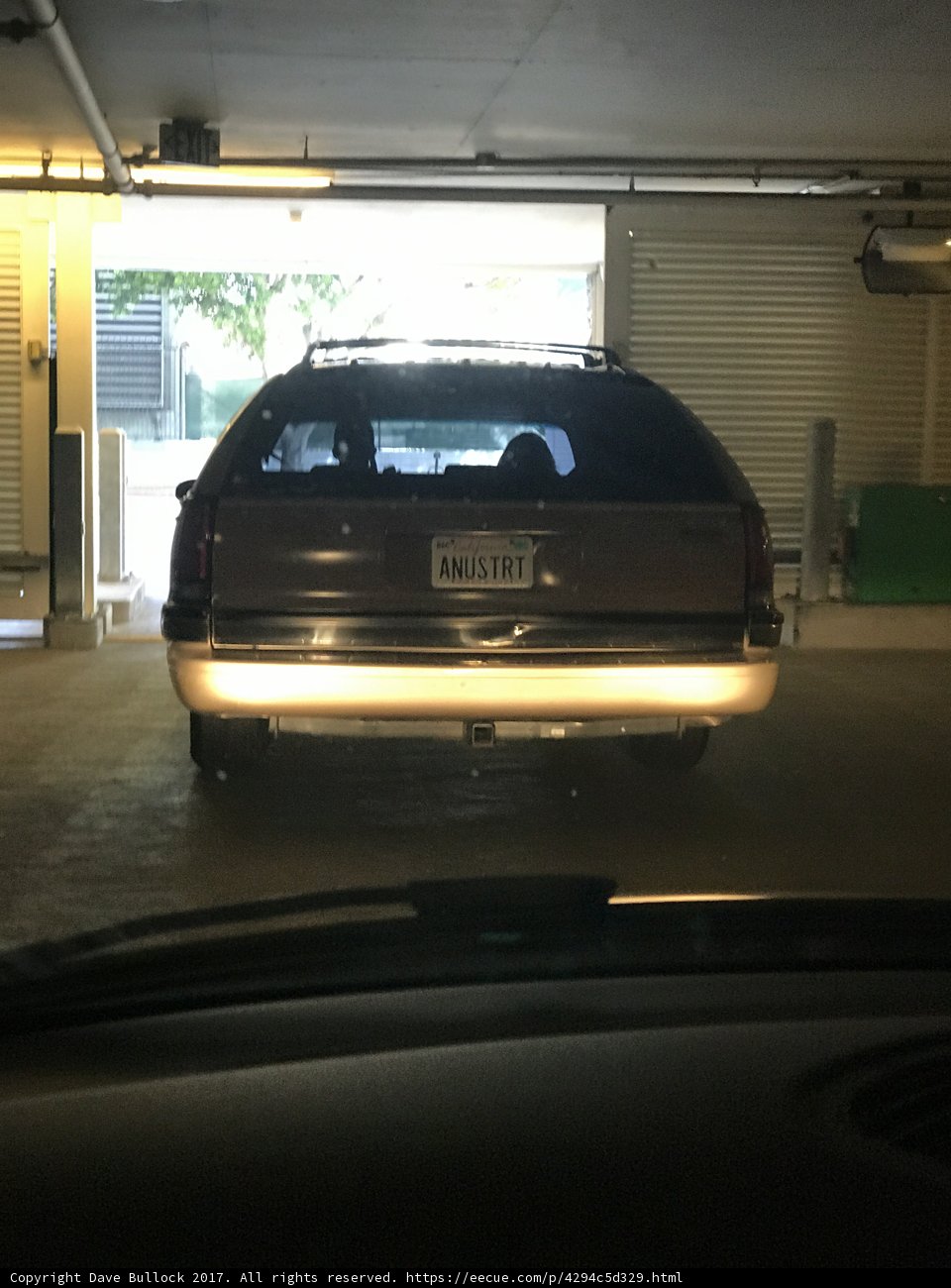 Parked Car in Well-Lit Garage