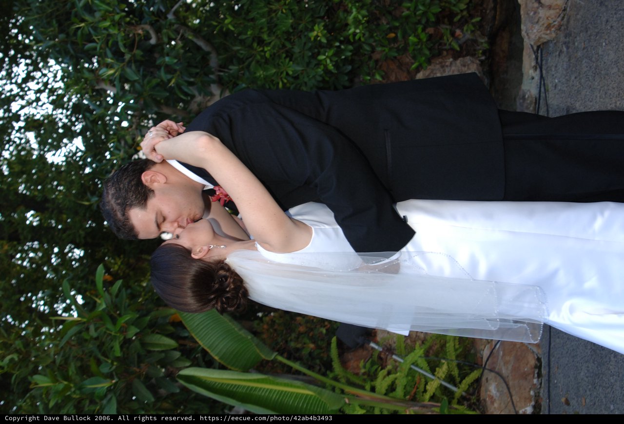 Bride and Groom Share First Kiss at Wedding