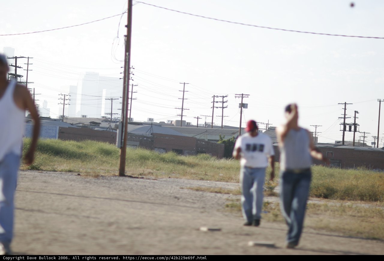 A Game of Baseball in the Open Field