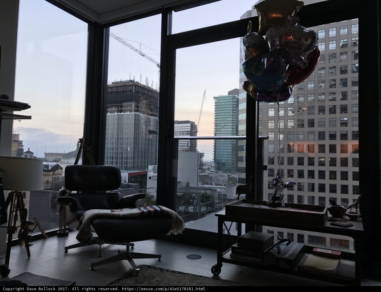 Cityscape View from a Cozy Living Room