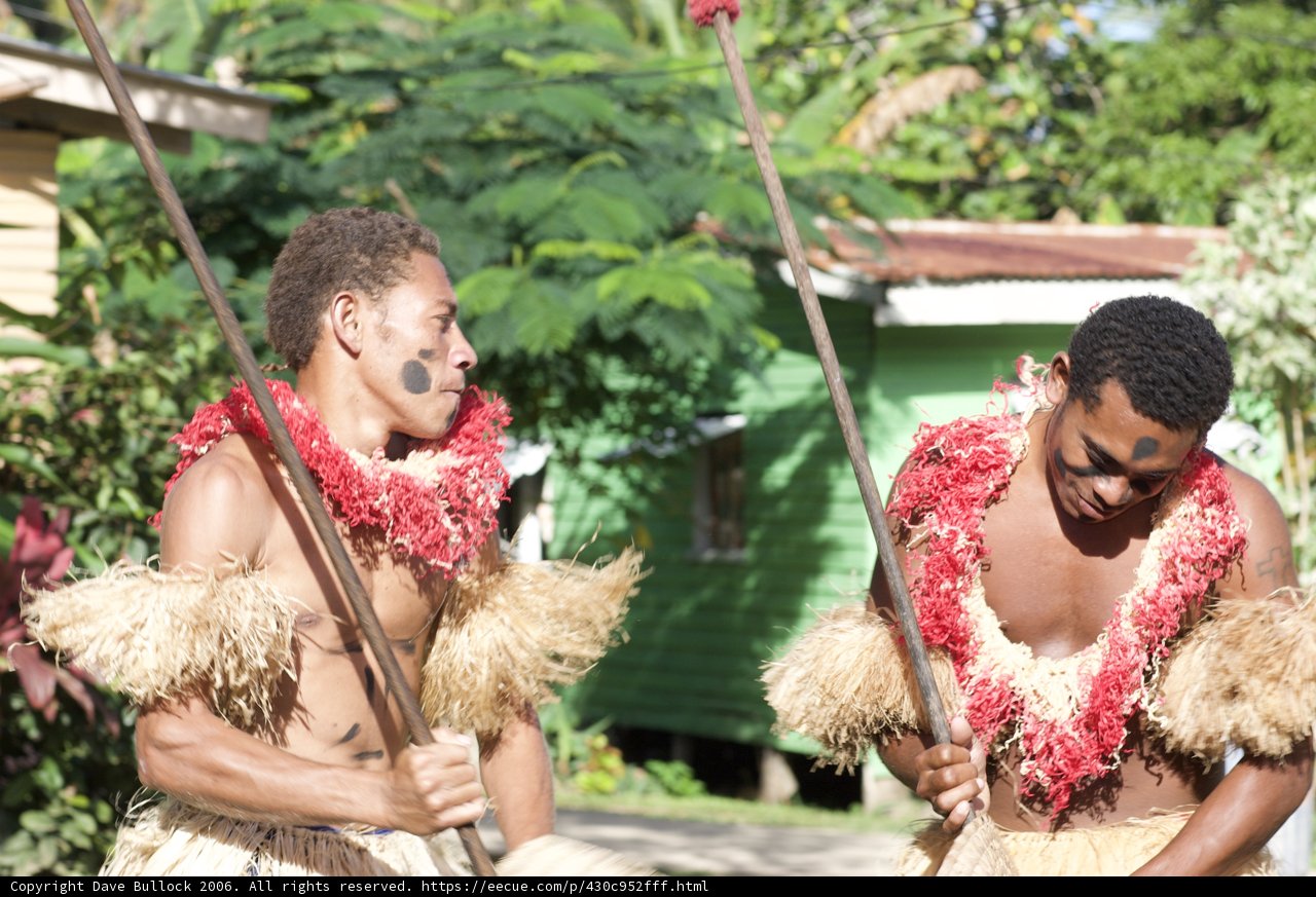 Spear-Wielding Traditional Dancers